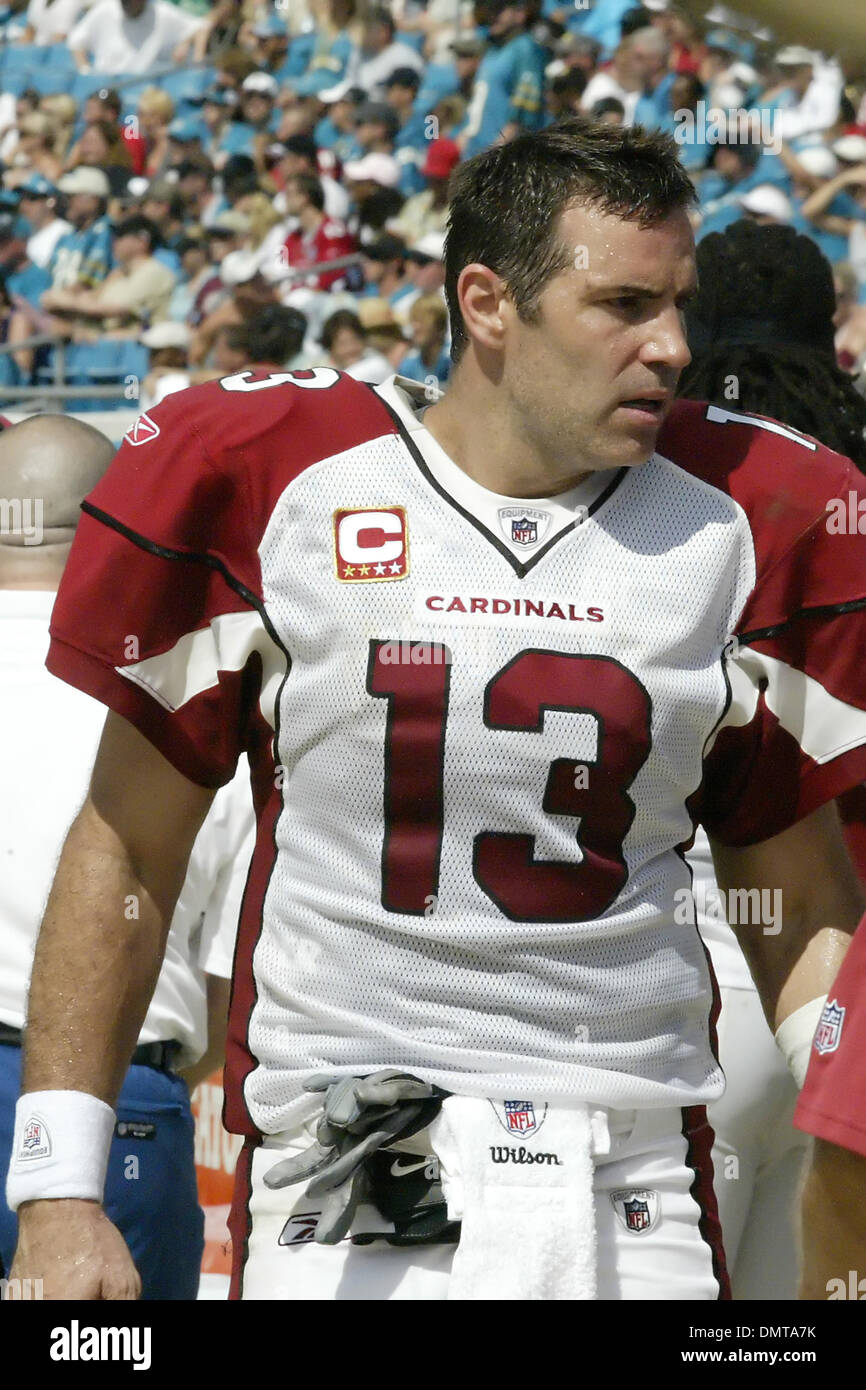 Arizona Cardinals quarterback Kurt Warner walks off the field