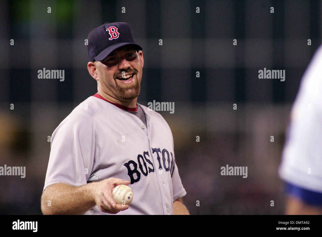 Boston Red Sox first baseman Kevin Youkilis jokes with Royals