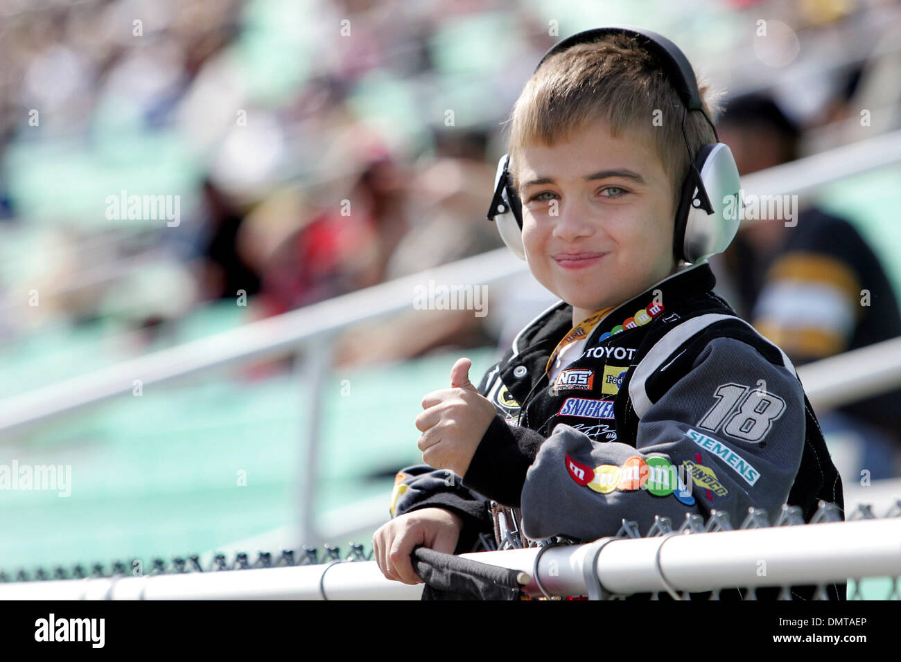 A young Kyle Busch fan gives a thumbs up during Price Chopper 400