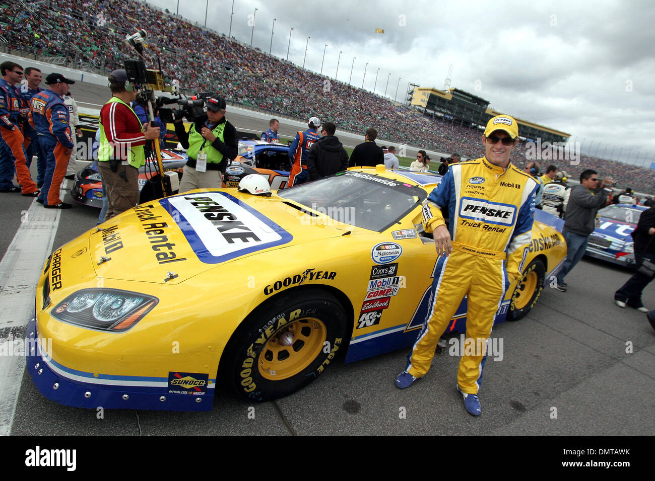 Nationwide Series top qualifier Parker Kligerman 22 stands by his car before the start of the