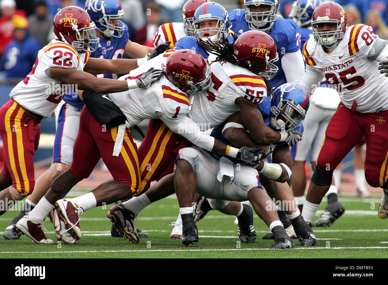 Kansas running back Toben Opurum (35) is finally brought down by Iowa ...