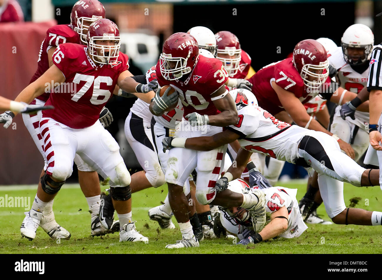 Temple Owls running back Bernard Pierce (30) running with the football while Ball State Cardinals corner Jason Pinkston (10) tries to tackle him during the NCAA football game between the Ball State Cardinals and the Temple Owls at Lincoln Financial Field in Philadelphia, Pennsylvania.  The Temple Owls beat the Cardinals, 24-19. (Credit Image: © Joe Nicola/Southcreek Global/ZUMApres Stock Photo