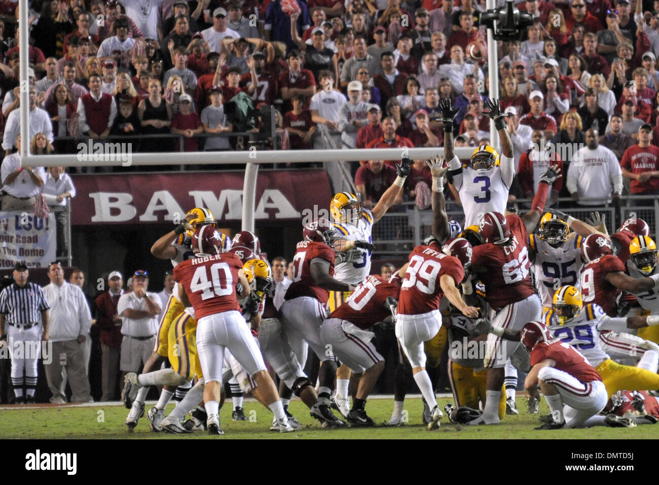 Alabama place kicker, 99 Leigh Tiffin, kicks a field goal during an