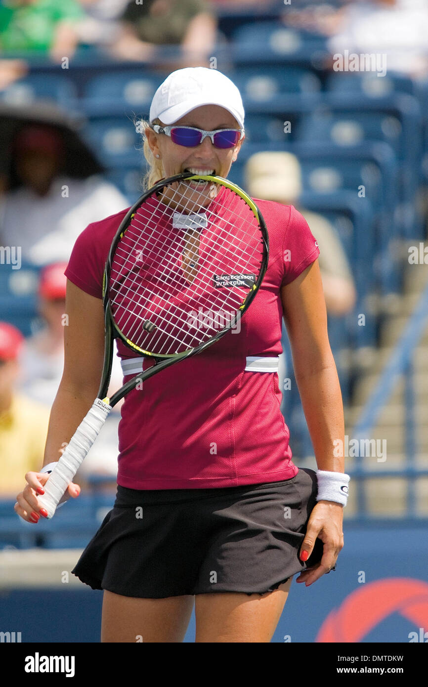 Anastasia Rodionova bites down on her racquet after a play in the ...
