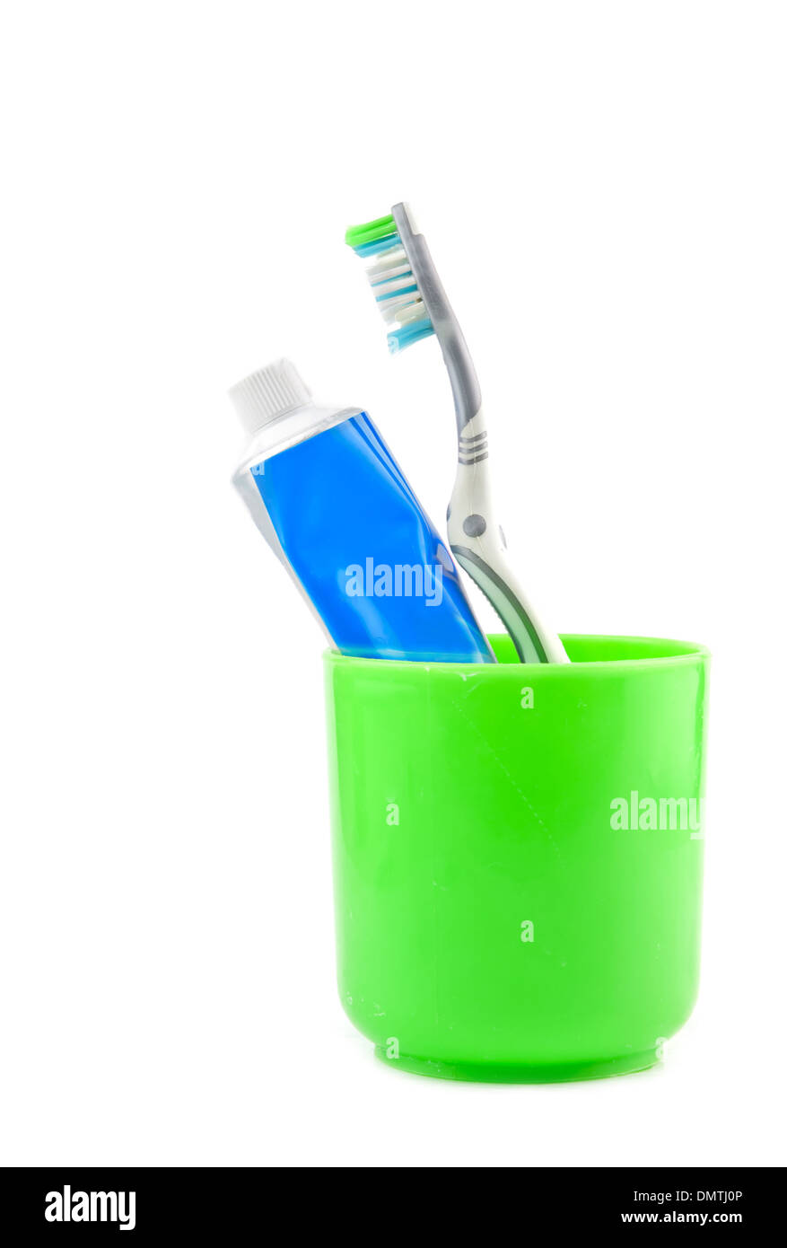 tooth brush in glass. Isolated on white background Stock Photo - Alamy