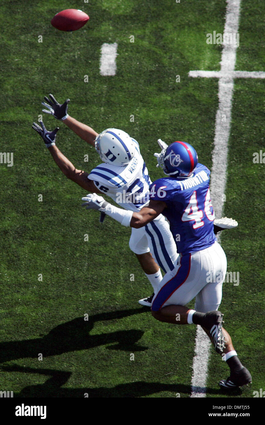 Duke wide receiver Donovan Varner (26) attempts to catch a long pass under pressure from Kansas cornerback Justin Thornton (46) during game action in the first half at Memorial Stadium. (Credit Image: © Jacob Paulsen/Southcreek Global/ZUMApress.com) Stock Photo