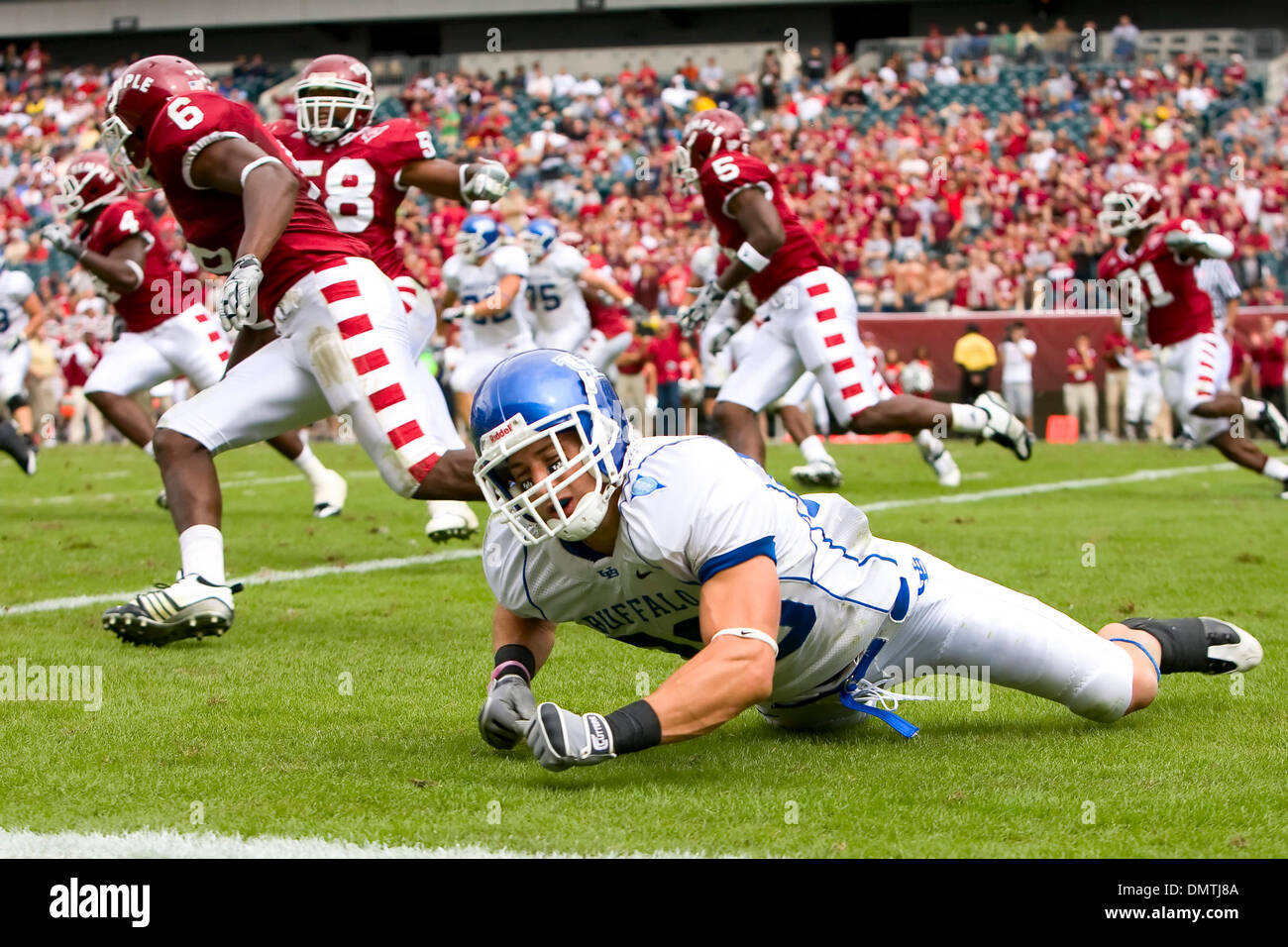 Buffalo Bulls wide receiver Brett Hamlin (88) falls to the ground after the pass that was meant for him was intercepted by Temple Owls corner Marquise Liverpool (28) during the NCAA football game between the Buffalo Bulls and the Temple Owls at Lincoln Financial Field in Philadelphia, Pennsylvania.  The Temple Owls beat the Buffalo Bulls, 37-13. (Credit Image: © Chris Szagola/South Stock Photo