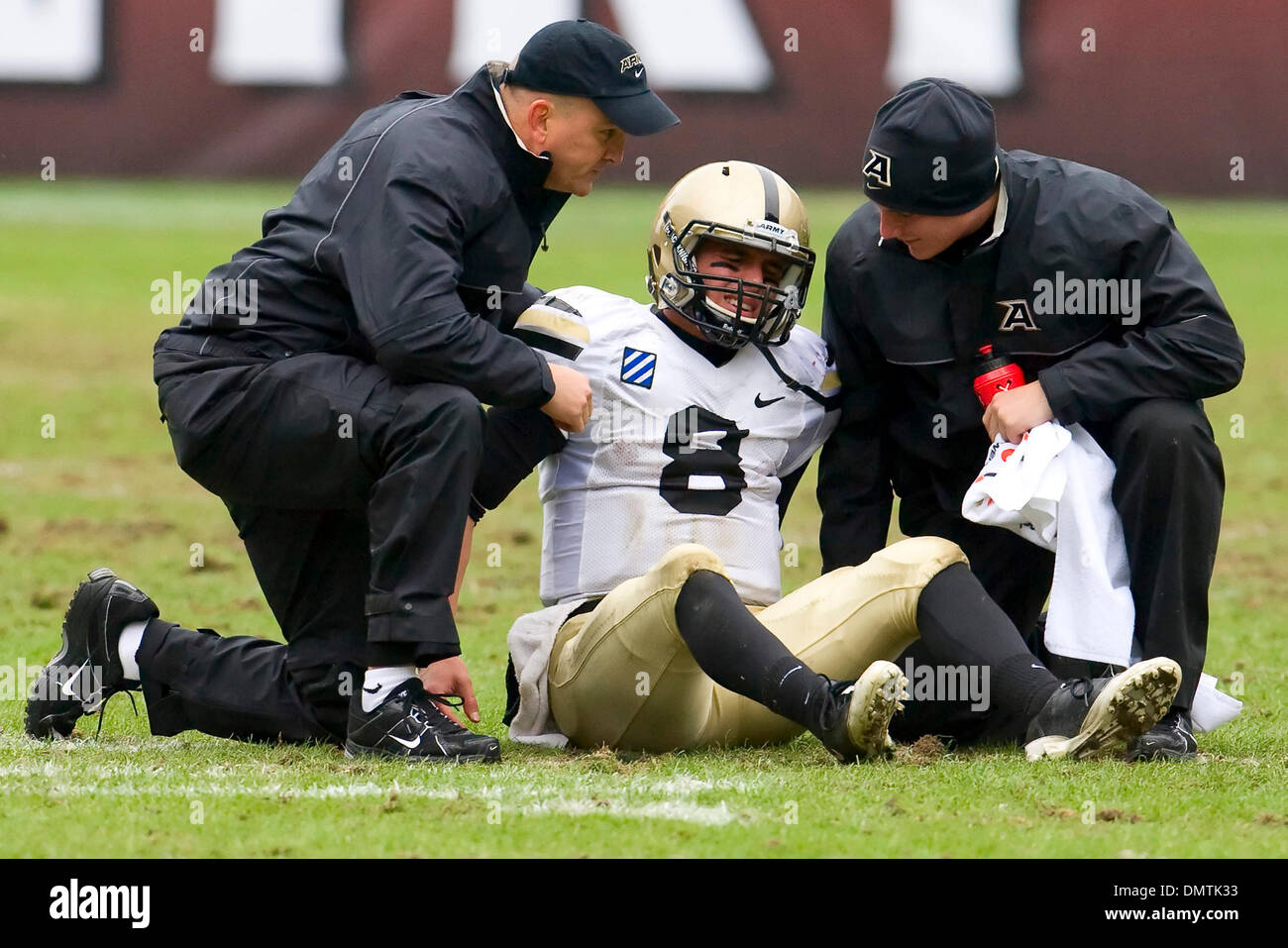 Army Black Knights quarterback Trent Steelman (8) gets looked at during