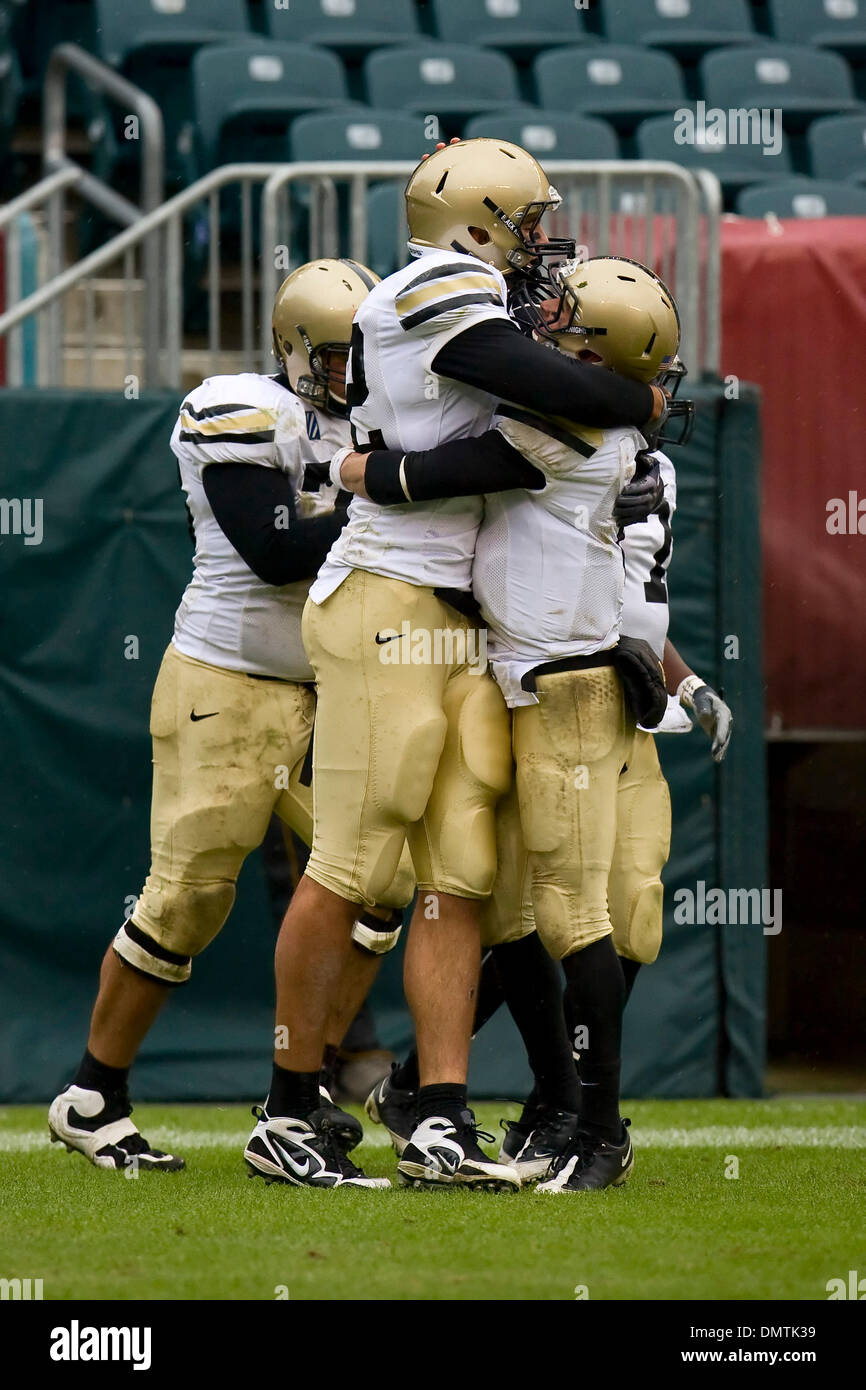 Army Black Knights quarterback Trent Steelman (8) gives Army Black