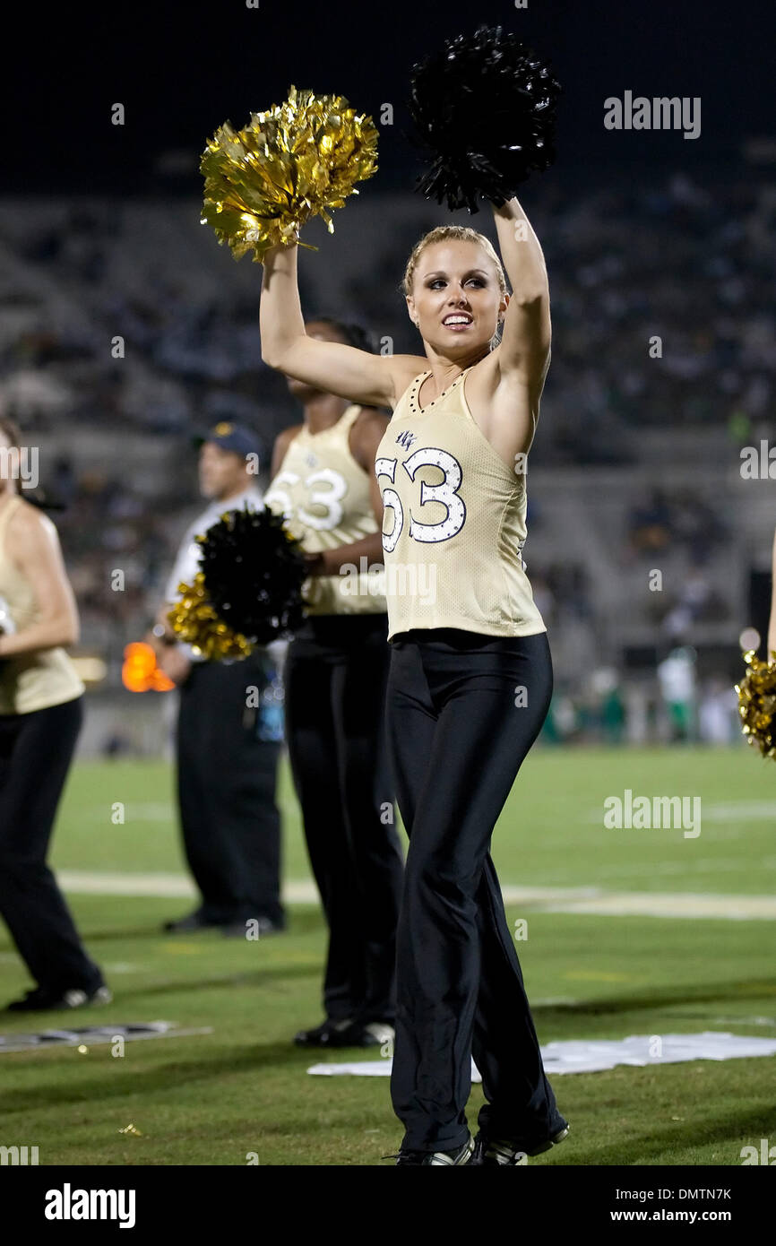 UCF Knights cheerleaders and the Marshall Thundering Herd in this