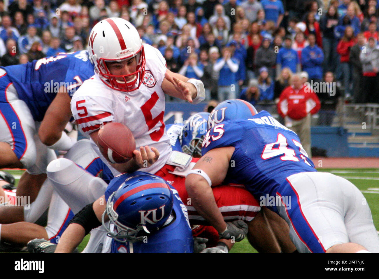 Nebraska quarterback Zac Lee (5) fumbles the ball on the goal line