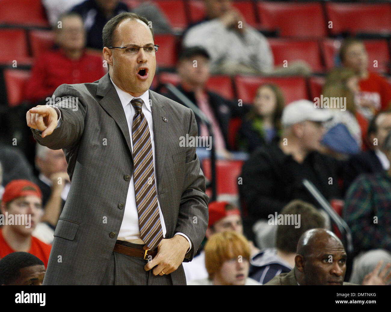 head coach Mark Fox directs payers at the game against Wofford