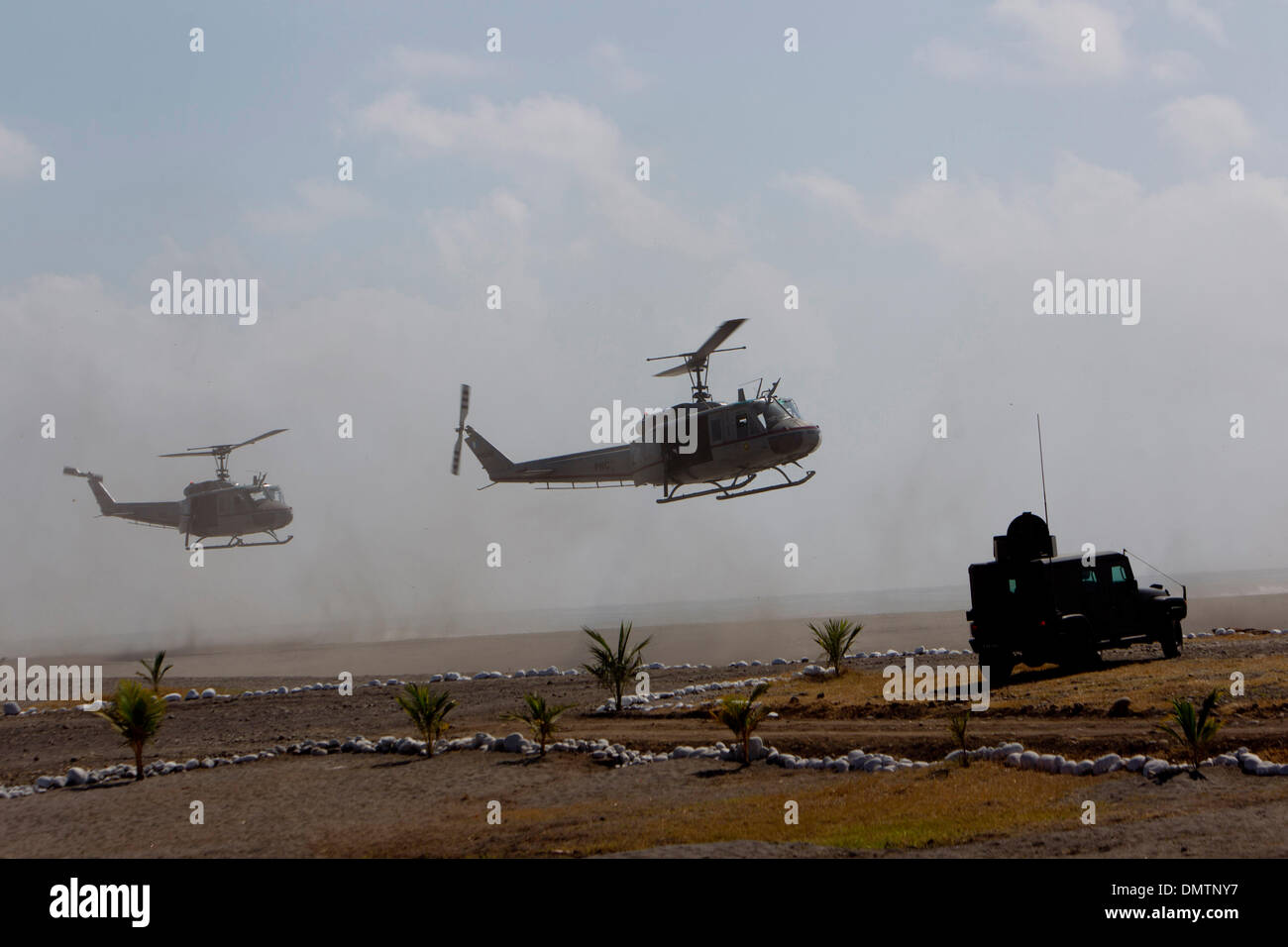 San Marcos, Guatemala. 16th December 2013. Helicopters and vehicles of Guatemalan Army participate in the inauguration of the 'Tecun Uman' Task Force in Ocos, Guatemala, on Dec. 16, 2013. Credit:  Xinhua/Alamy Live News Stock Photo