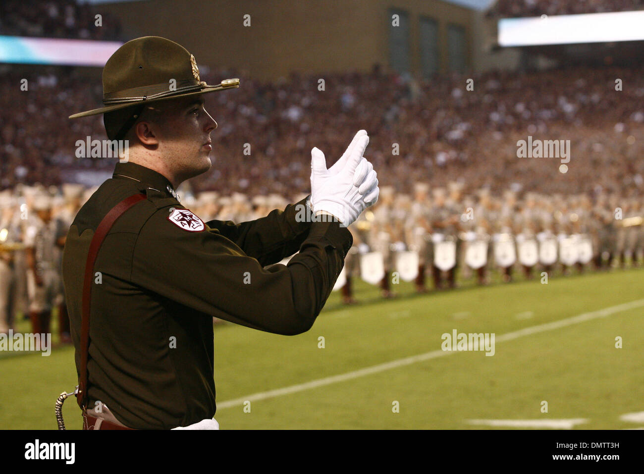 A senior member of the Texas A&M Corps of Cadets stands in front of the