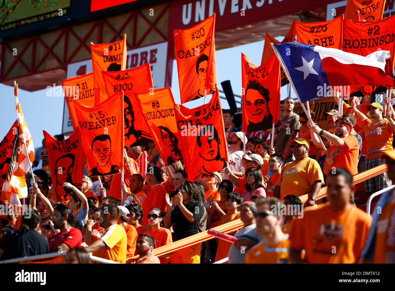 Houston Dynamo fans wave a Texas flag, hold their hands in the air, and  hold signs with each of the Dynamo players. The Houston Dynamo and the LA  Galaxy tie the game