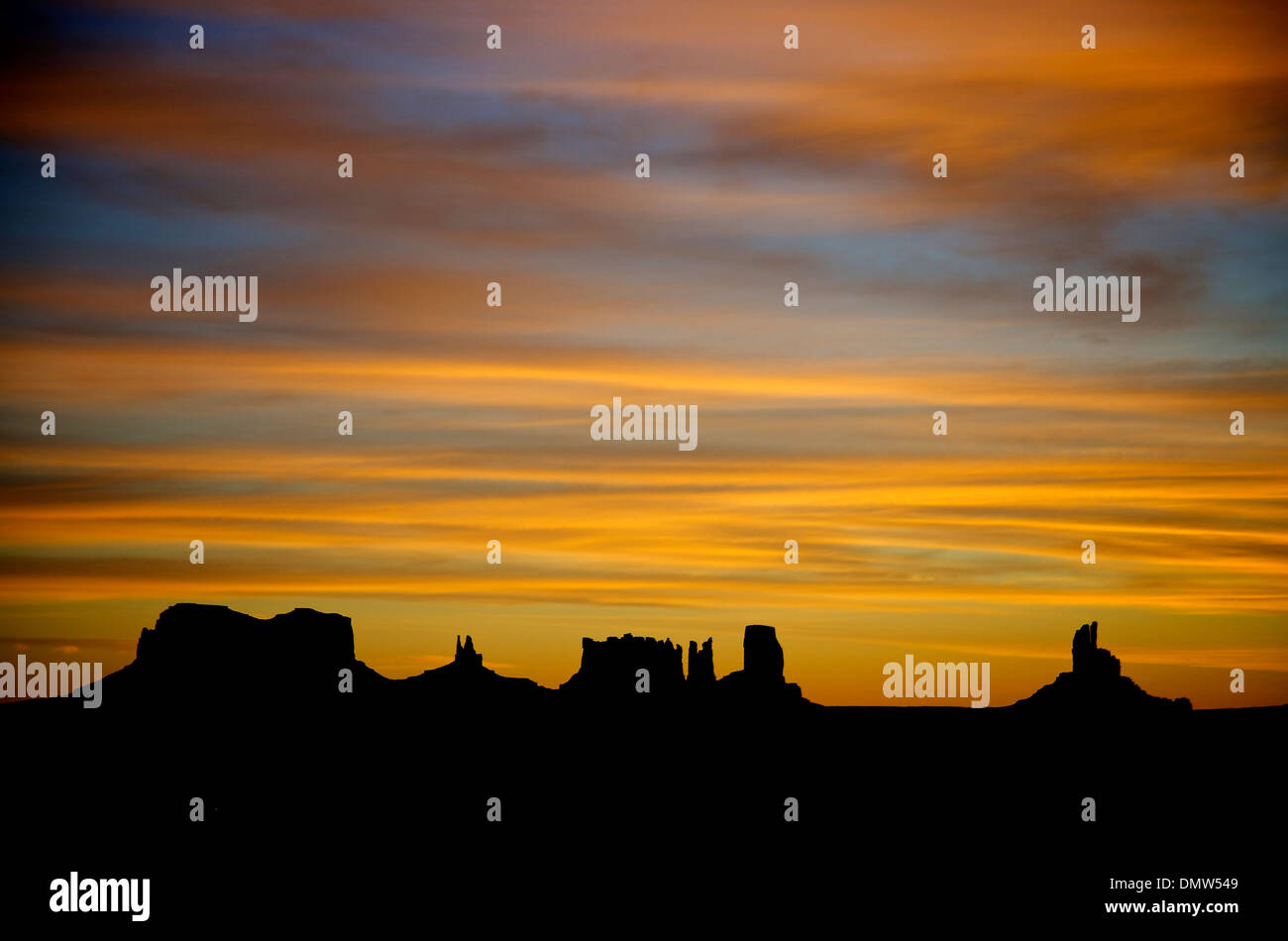 Dawn, sunrise at Monument Valley Navajo Tribal Park, border between Arizona and Utah, AZ, UT, United States of America, USA, US Stock Photo