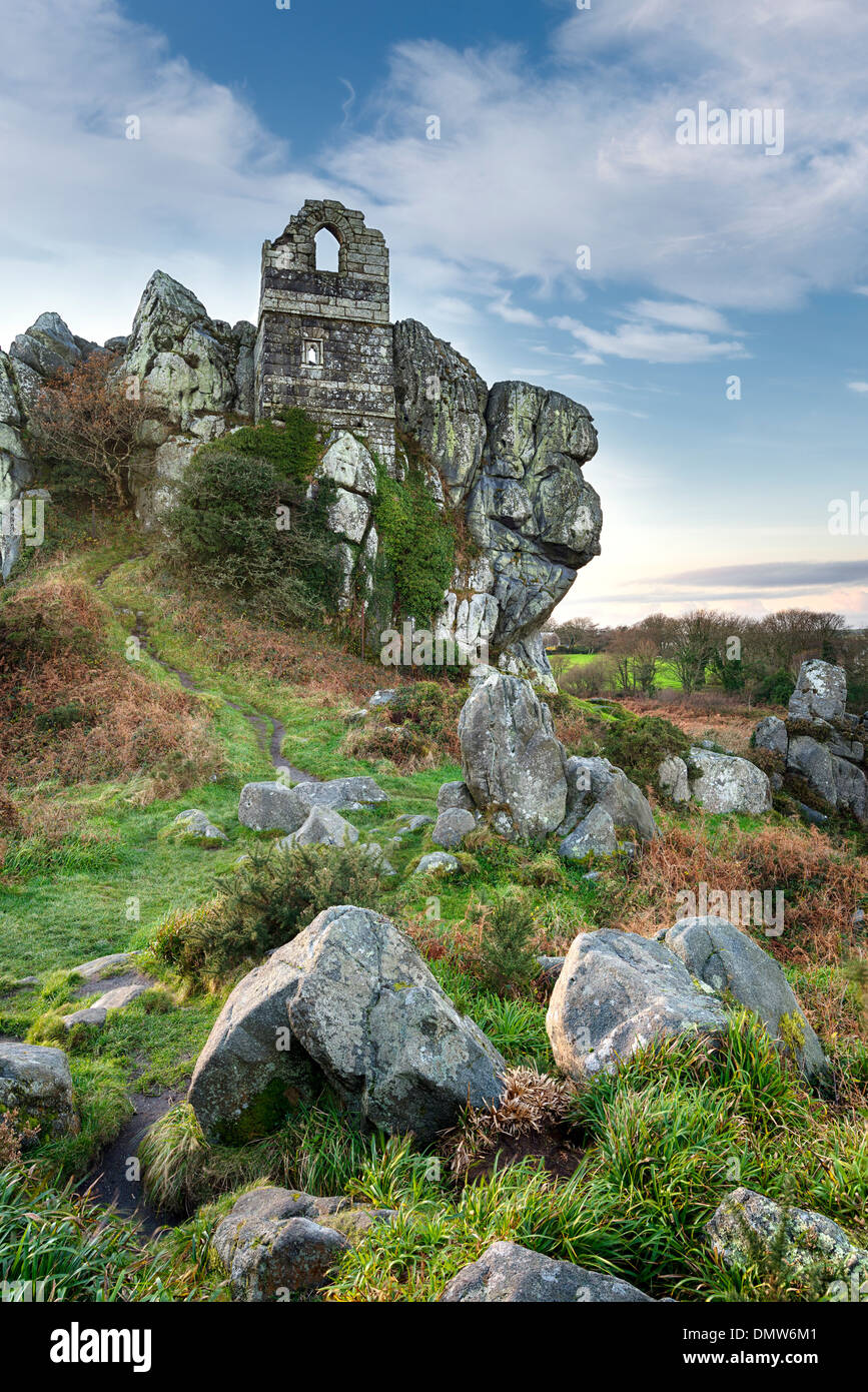 An ancient ruined chapel built in to a craggy granite tor at Roche Rock in Cornwall Stock Photo