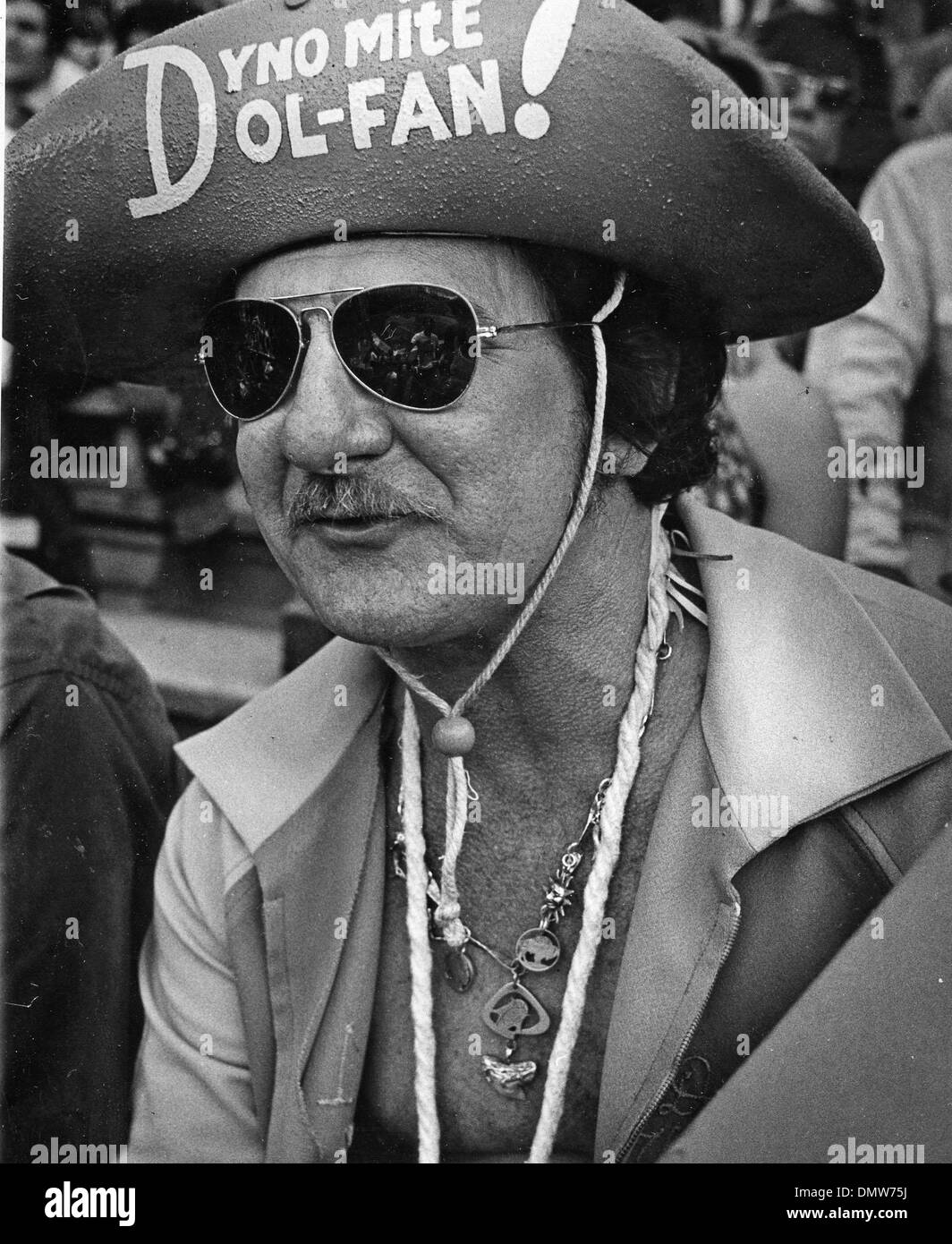 Dec 07, 1975 - Miami, FL, USA - Dolphin fan DENNIS (DENNY) SYM aka 'Dolfan Denny'  wearing his 'Rustoleum Hat'. For 34 years Denny Sym cheered the Miami Dolphins.  (Credit Image: © Mary Duvendack/Miami News/Palm Beach Post/ZUMA Press) RESTRICTIONS: USA Tabloid RIGHTS OUT! Stock Photo