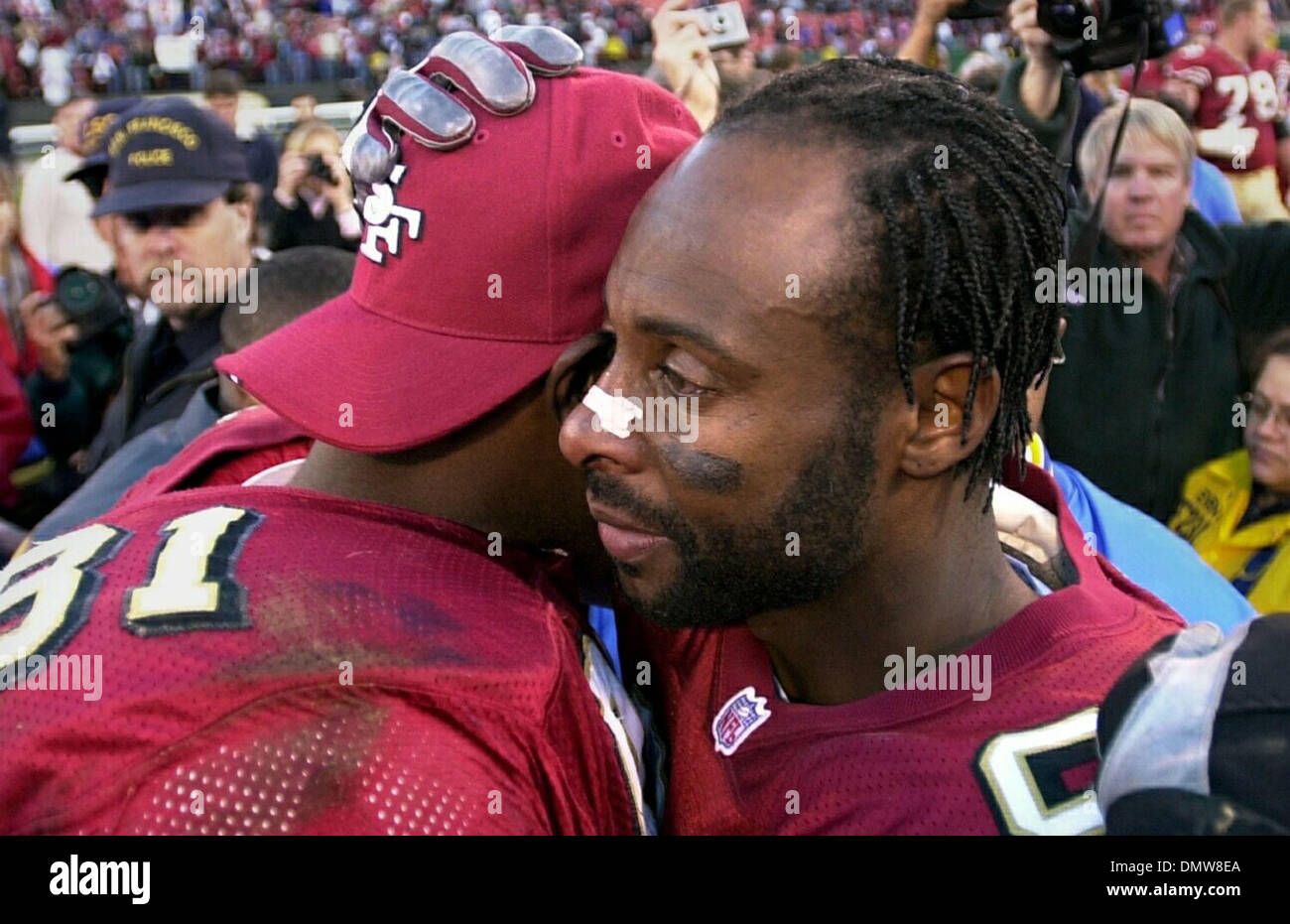 Dec 16, 2000; San Francisco, CA, USA; An emotional Jerry Rice hugs heir ...