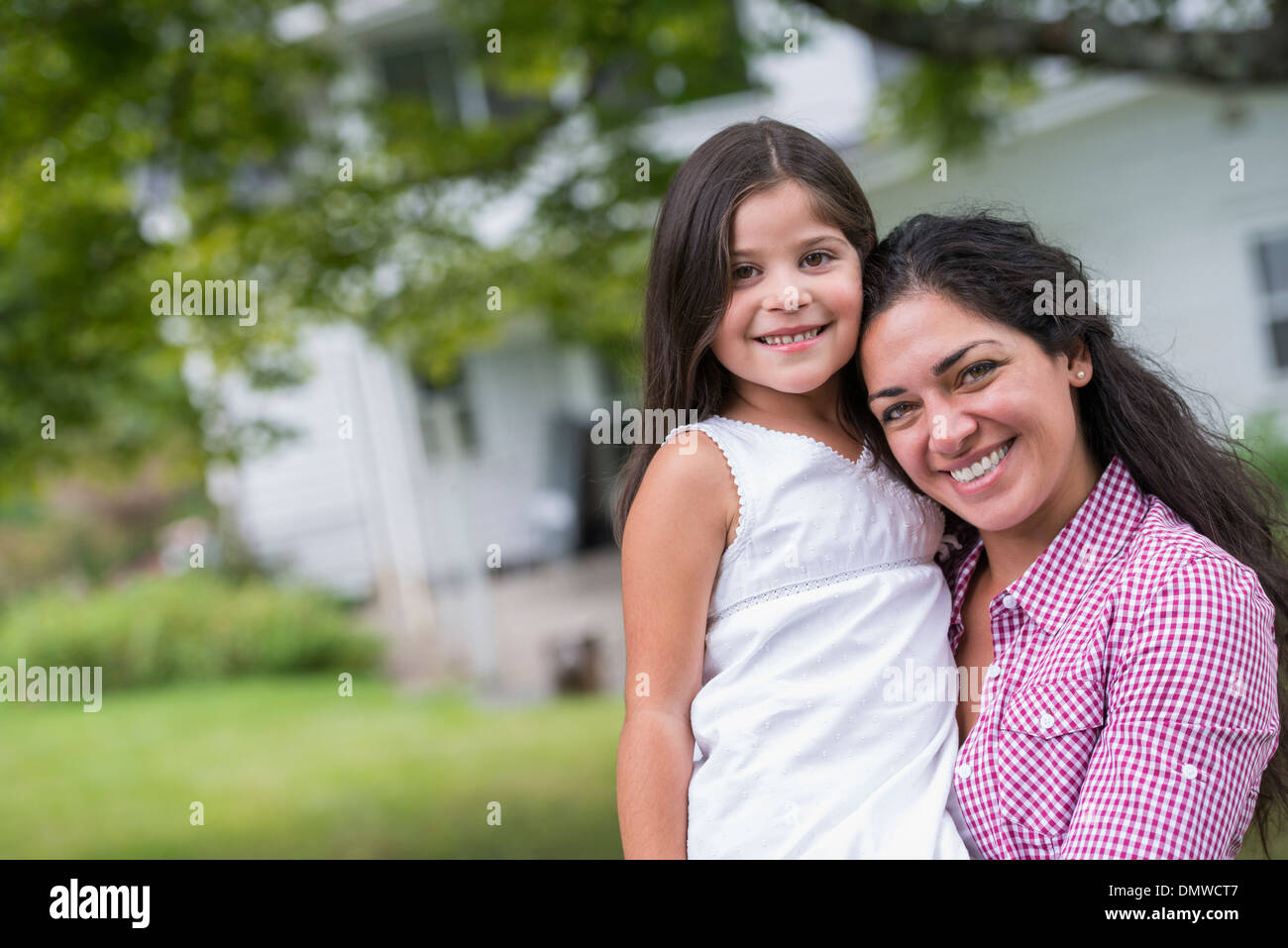 A mor and daughter in a country garden. Stock Photo