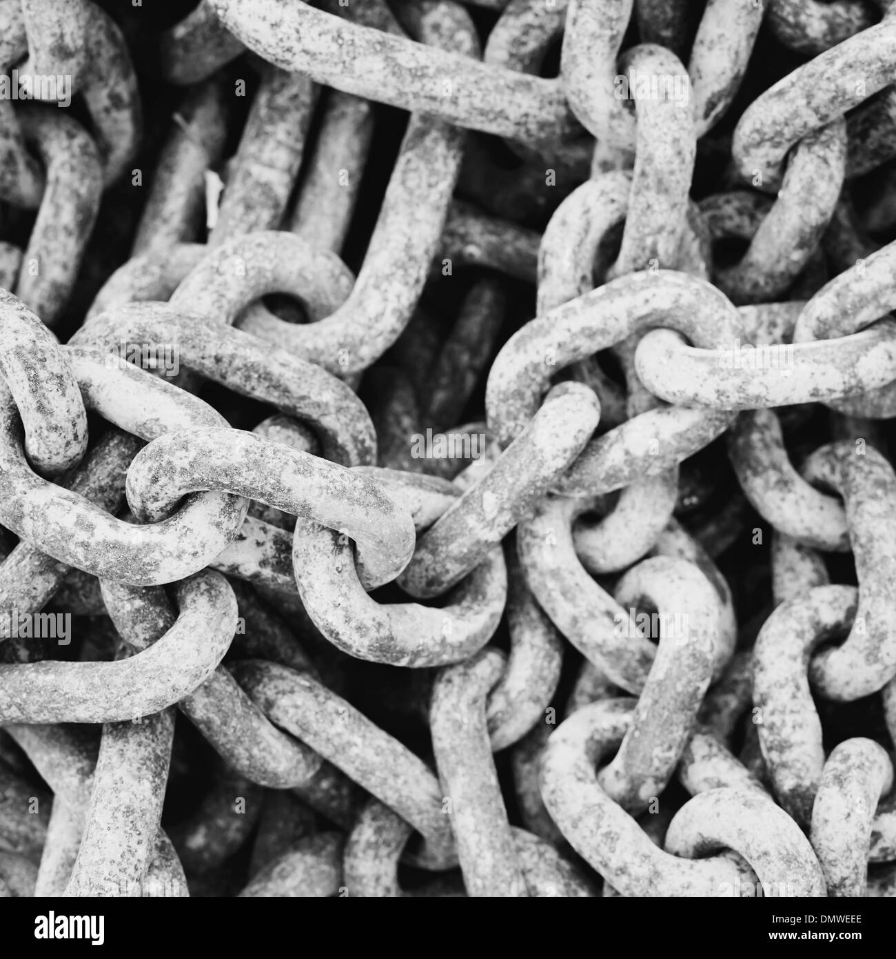 Close up of industrial chains in a heap. Stock Photo