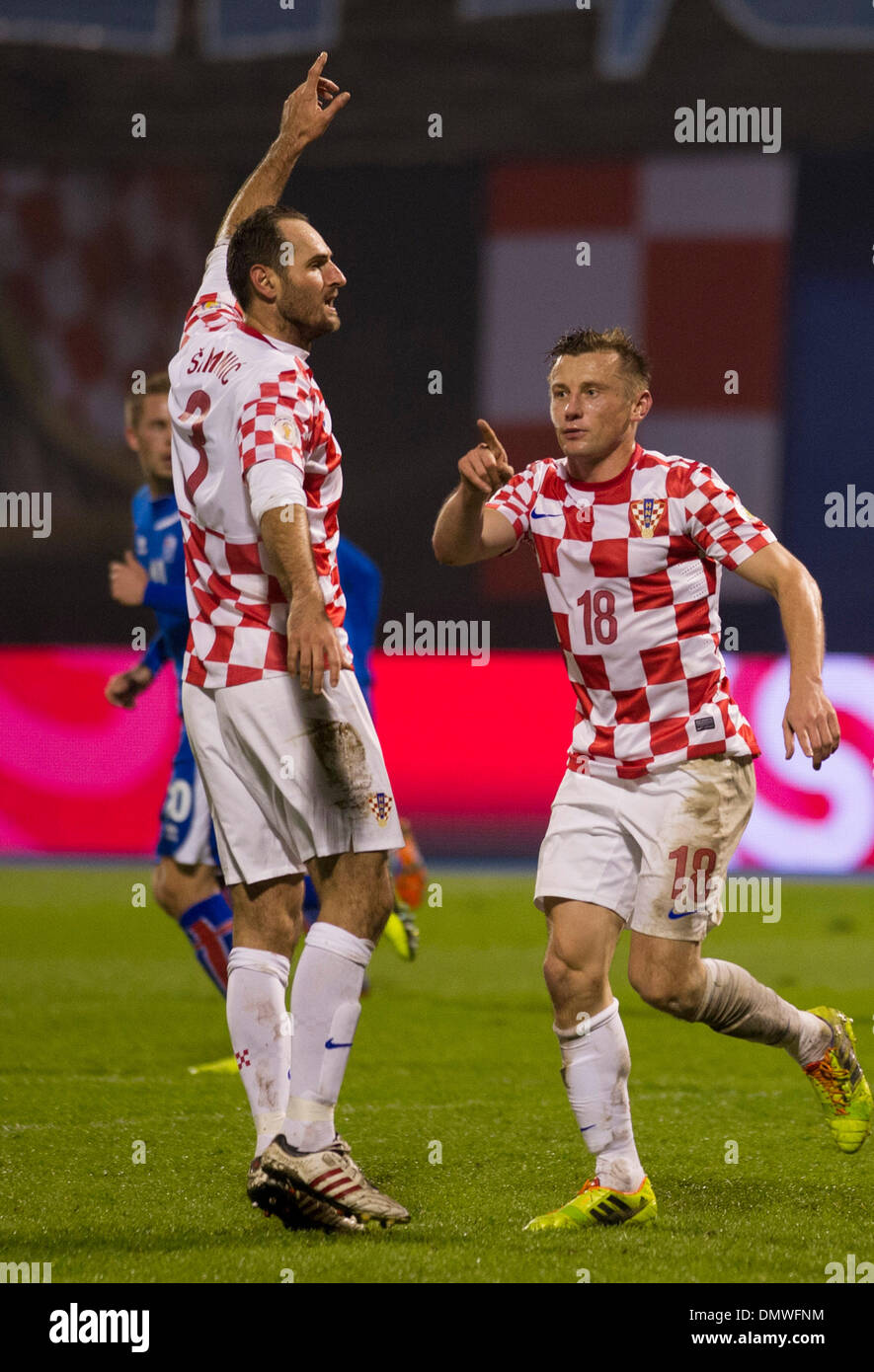 (131217) -- ZAGREB, Dec. 17, 2013 (Xinhua) -- Photo taken on Nov. 19, 2013 shows Josip Simunic of Croatia (L) gestures during 2014 FIFA World Cup qualifying match against Iceland at Maksimir stadium in Zagreb, Croatia.     FIFA handed Croatia defender Josip Simunic a 10-game ban to make him miss the entire World Cup after he led fans into a pro-Nazi chant following the play-off win over Iceland last month. The world soccer's governing body confirmed on Monday that Simunic's ban will start at the World Cup in Brazil, and that he will also be banned from entering the stadium for any of his count Stock Photo