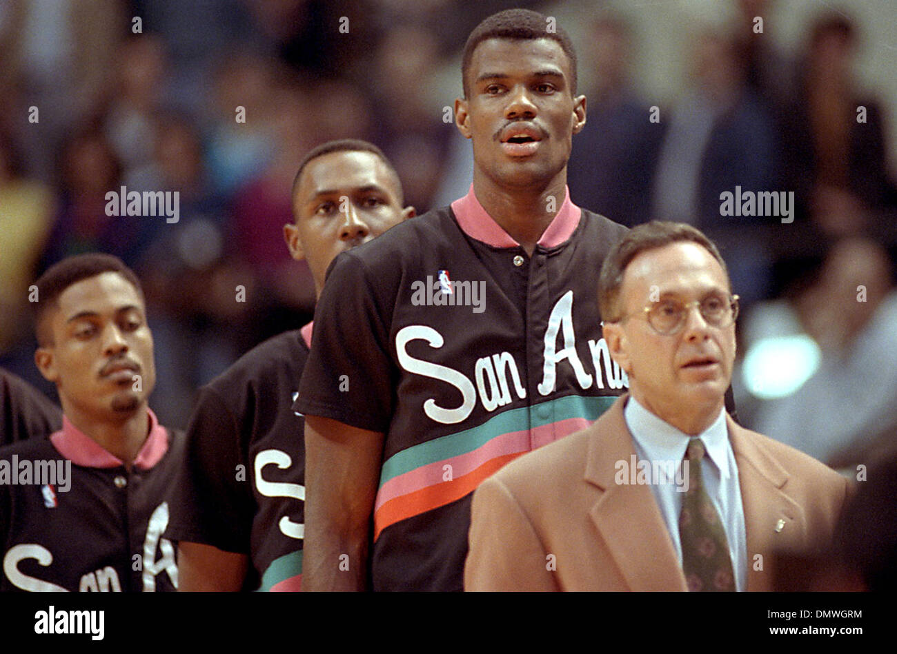 Nov 01, 1991; San Antonio, TX, USA; Coach Larry Brown and David Robinson stand while the National Anthem takes place in a game against the Dallas Mavericks at the HemisFair Arena in San Antonio on January 16, 1991. Stock Photo