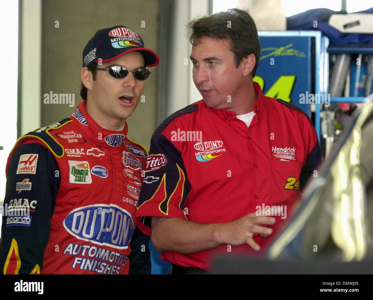 Jun 23, 2001; Sonoma, CA, USA; Jeff Gordon, #24, chats with crew chief Robbie Loomis after returning from taking practice laps on Saturday, June 23, 2001 in preparation for Sunday's Dodge/Save Mart 350 at Sears Point Raceway in Sonoma, Calif. Stock Photo