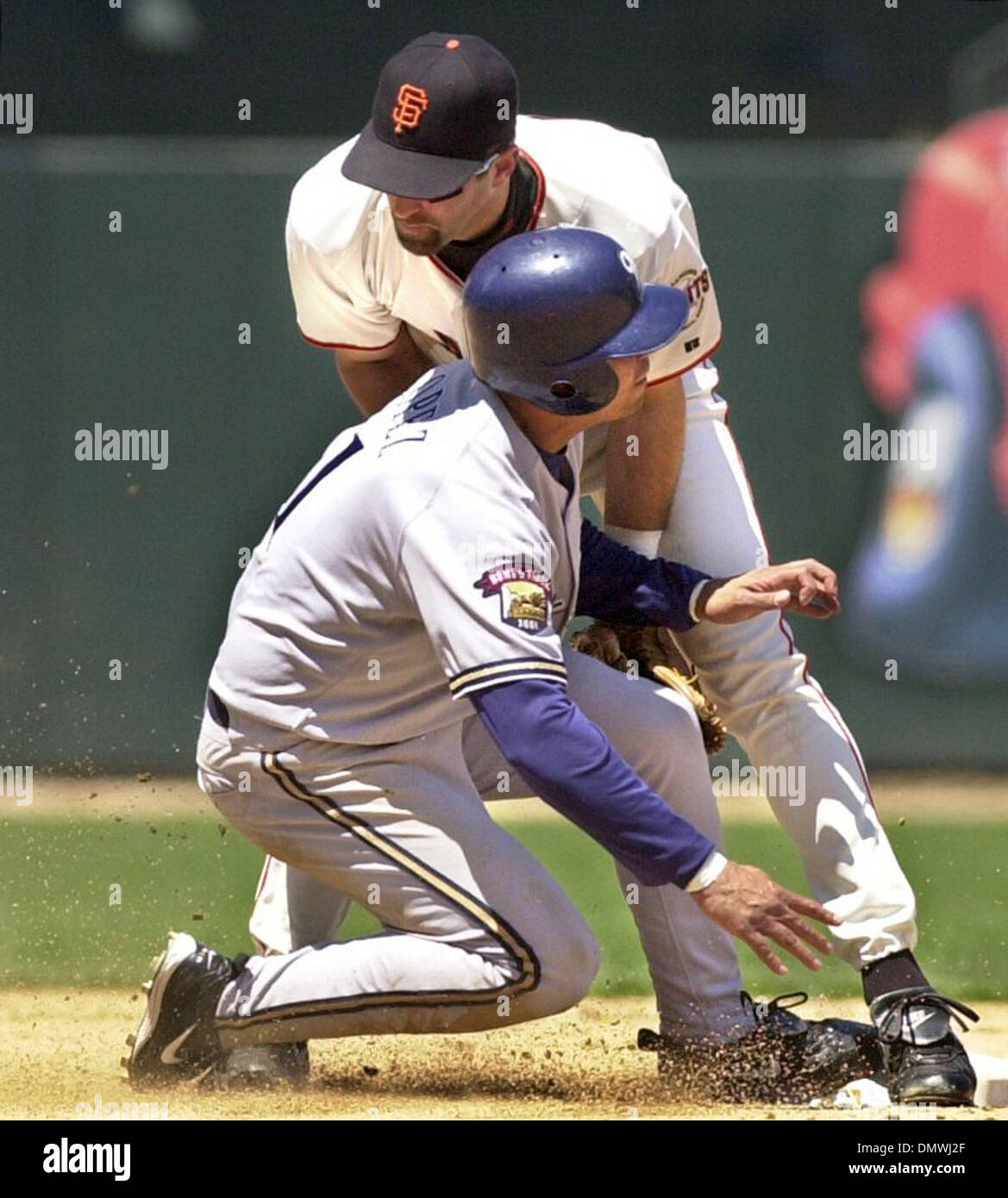 Jul 07, 2001; San Francisco, CA, USA; Giants #35 Rich Aurilia  (top) collides with Brewers #1 Luis Lopez at second base during the top of the 5th inning in San Francisco, Calif., on Saturday, July 7, 2001. An error on the play advanced Lopez to third base. The Brewers went on to win the game 13-3. Stock Photo