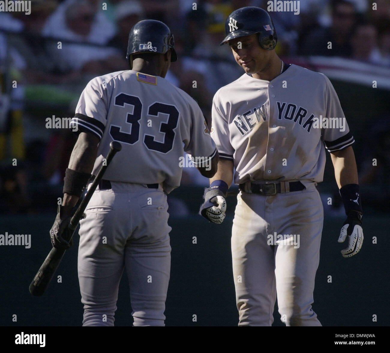 Oct 14, 2001; Oakland, CA, USA; New York Yankees, L-R, Alfonso Soriano and  Derek Jeter celebrate after scoring in the fourth inning during game four  of the American League Division Series against