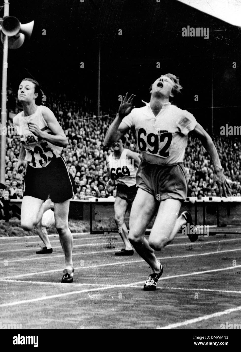 Aug. 4, 1948 - London, England, U.K. - The 1948 Summer Olympics were held in London, they were the first Summer Olympics since the 1936 Berlin Games due to World War II.  PICTURED: The dramatic finish of the 80 meter hurdles, won by F.E. BLANKERS-KOEN (R) of Holland.  (Credit Image: © KEYSTONE Pictures USA/ZUMAPRESS.com) Stock Photo