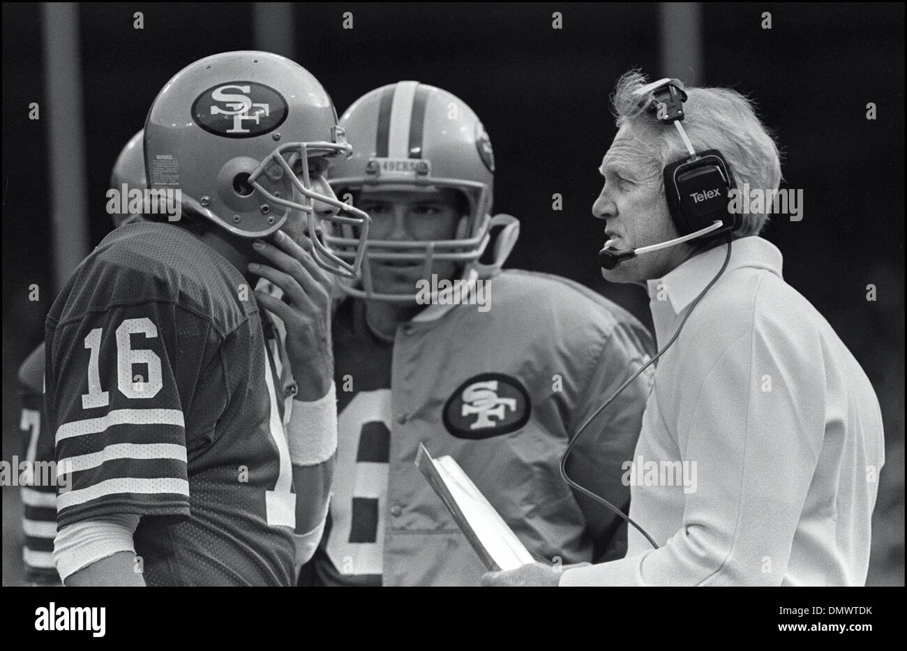 San Francisco, California, USA - BILL WALSH, the inventor of the West Coast Offense, was one of the greatest football coaches of all time. Walsh, guided the San Francisco 49ers to three championships and six NFC West division titles in his 10 years as head coach, has died at the age of 75, following a long battle with leukemia. PICTURED: JOE MONTANA with head coach Bill Walsh at Ca Stock Photo