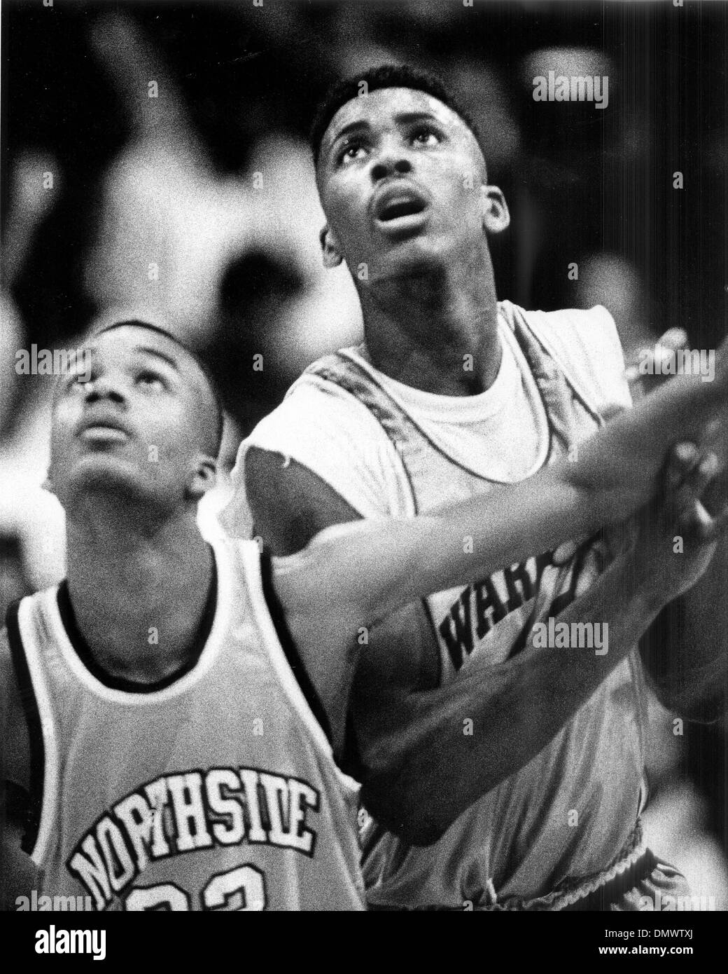 Dec. 13, 1993 - Memphis, TN, U.S. - Lorenzen Wright (right), of Booker T. Washington High School,  battles Northside's Anthony Caswell for position under the basket in December 1993. Law enforcement officials found the body of the missing Memphis basketball star Wednesday, July 28, 2010 in a wooded area at Hacks Cross and Winchester in southeast Memphis. Wright played two seasons a Stock Photo