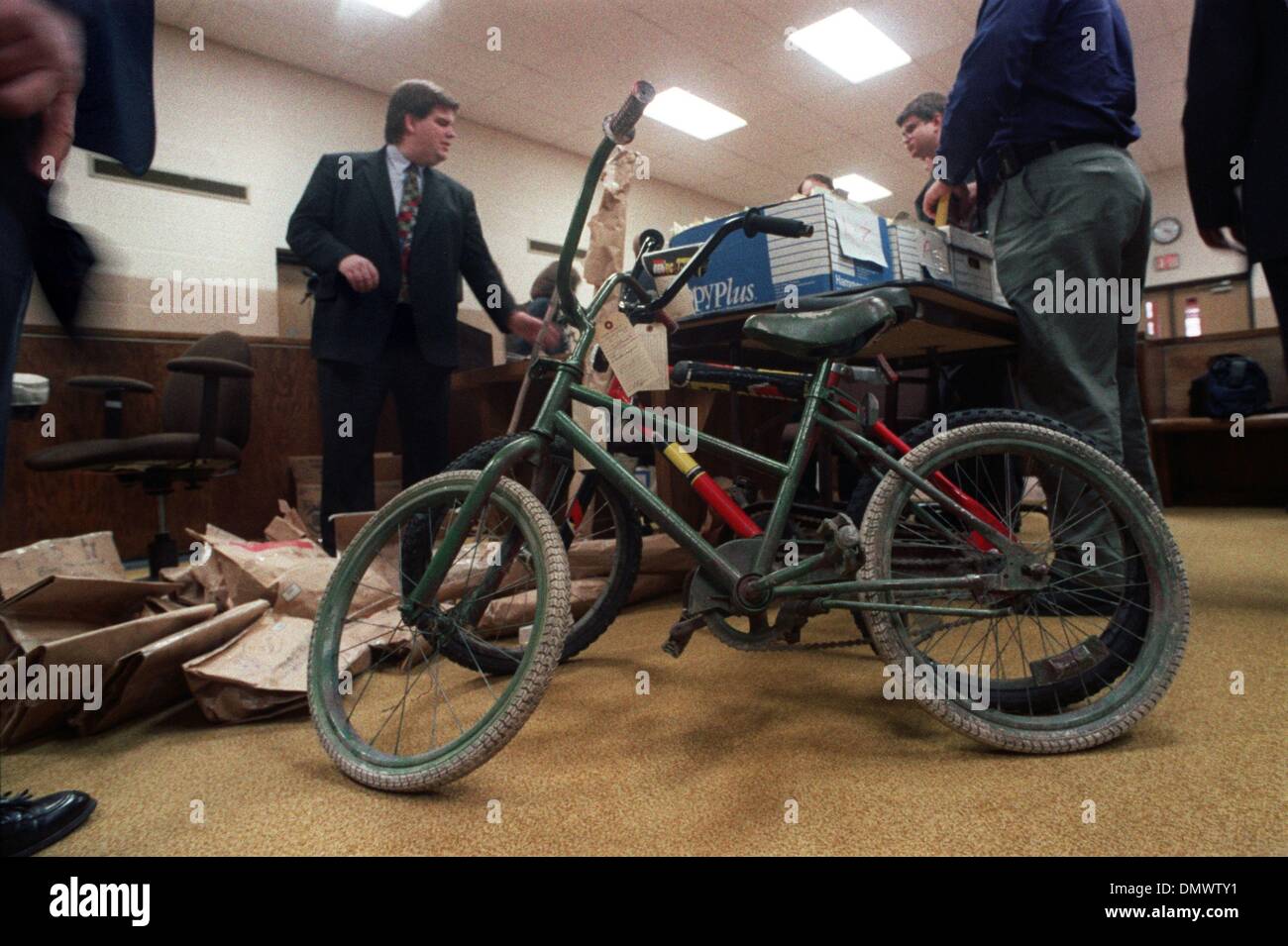 Jan. 26, 1994 - Corning, AR, U.S. - January 26, 1994 - The last time Michael Moore, Christopher Byers and Steve Branch were seen alive they were riding these bicycles, which are entered as evidence in the murder trial of Jessie Lloyd Misskelley Jr. One of Misskelley 's attorneys, Greg Crow of Paragould, is at left. Among witnesses on the first day of testimony Thursday was Steve Br Stock Photo
