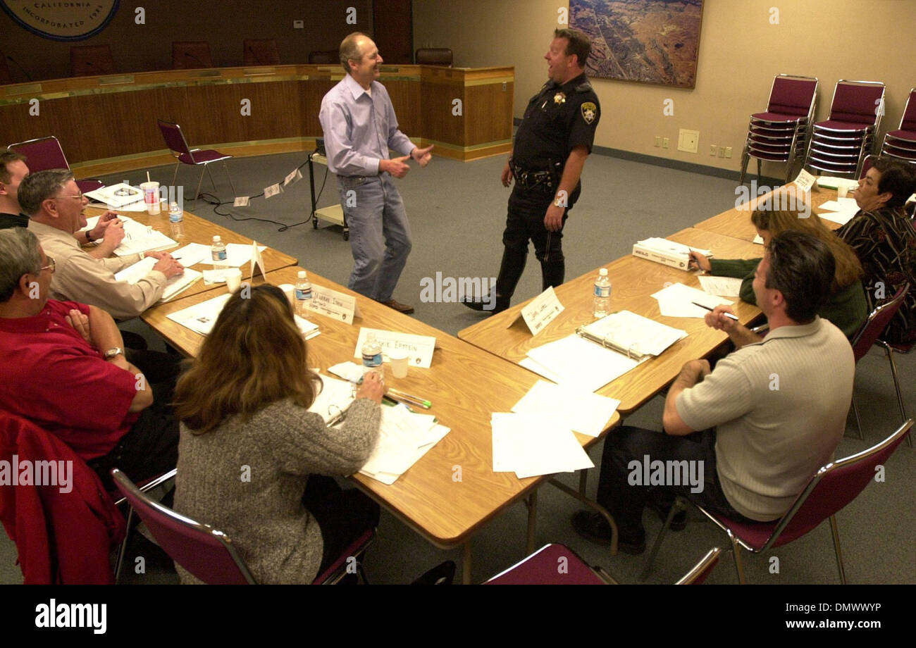 Mar 28, 2002; Walnut Creek, CA, USA; After having a few alcoholic drinks volunteer Pete Studt (cq) (left) and San Ramon Traffic Officer David Heinbauch (cq) (right) joke around during San Ramon's citizen's academy DUI class in San Ramon, Calif., on Thursday, March 28, 2002. Studt volunteered to drink alcohol in order for the class to better understand police DUI procedures and arre Stock Photo