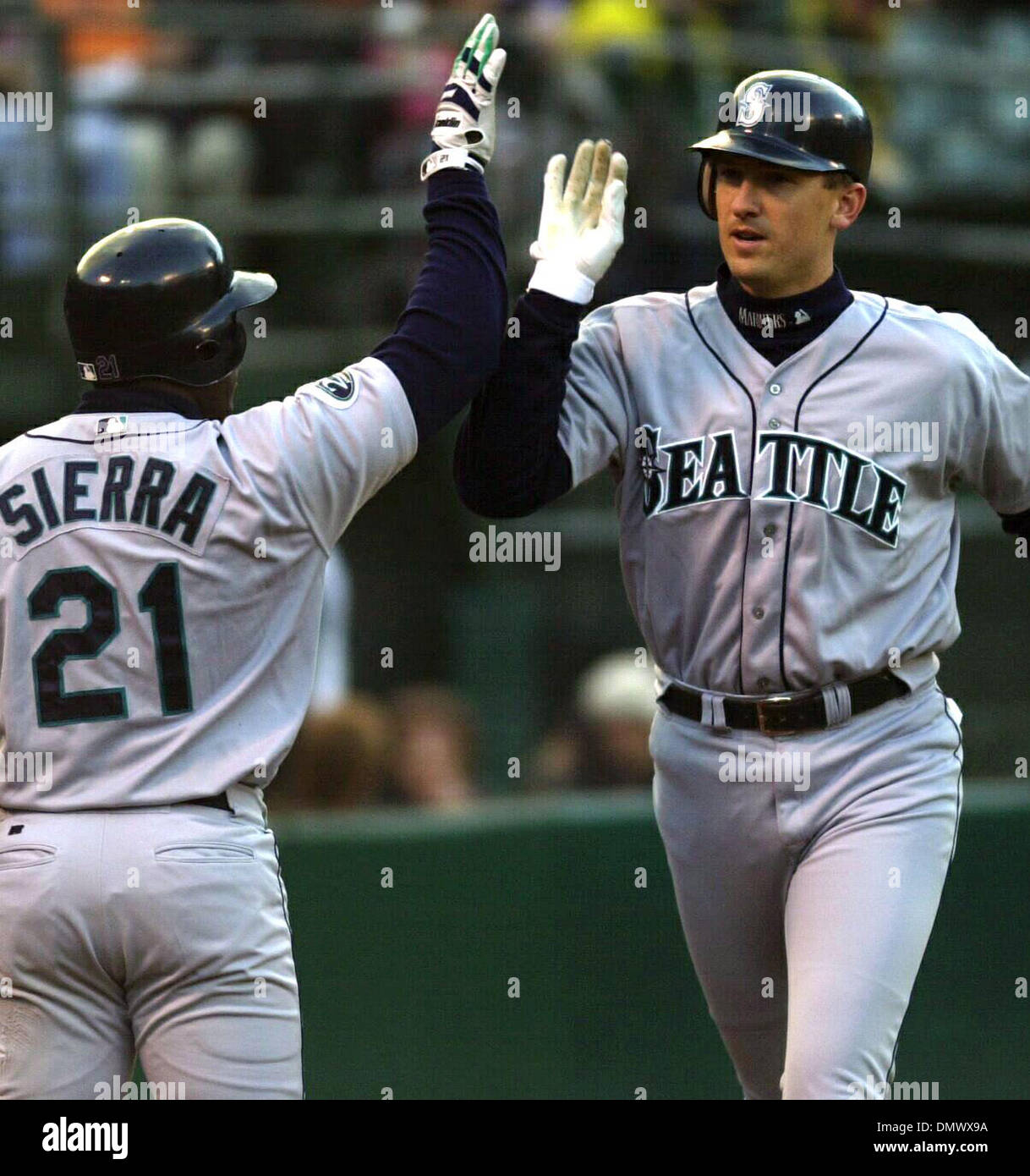 Apr 21, 2002; Oakland, CA, USA; Seattle's John Olerud gets a high five