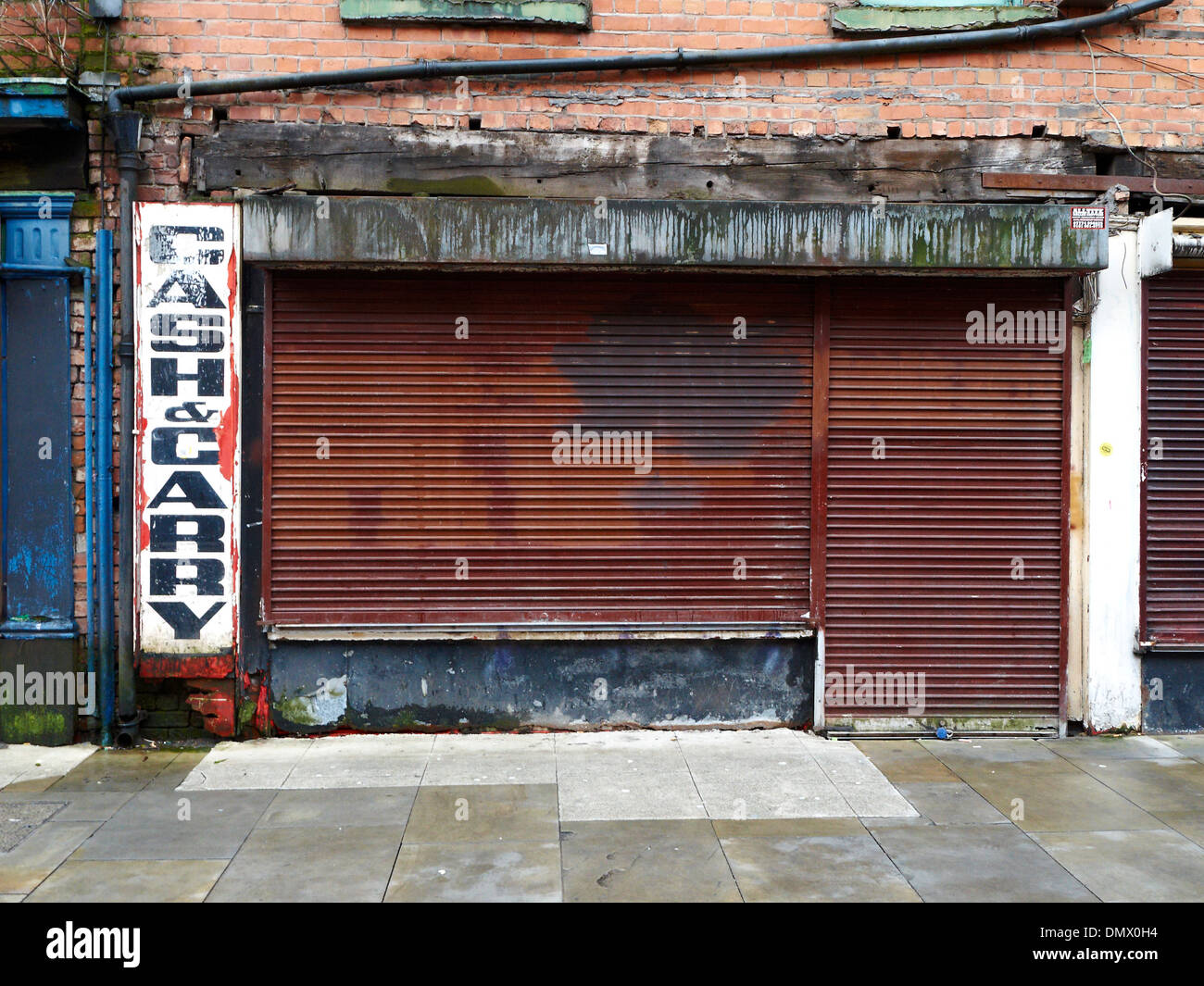 Closed down Cash&Carry shop in Northern Quarter Manchester UK Stock