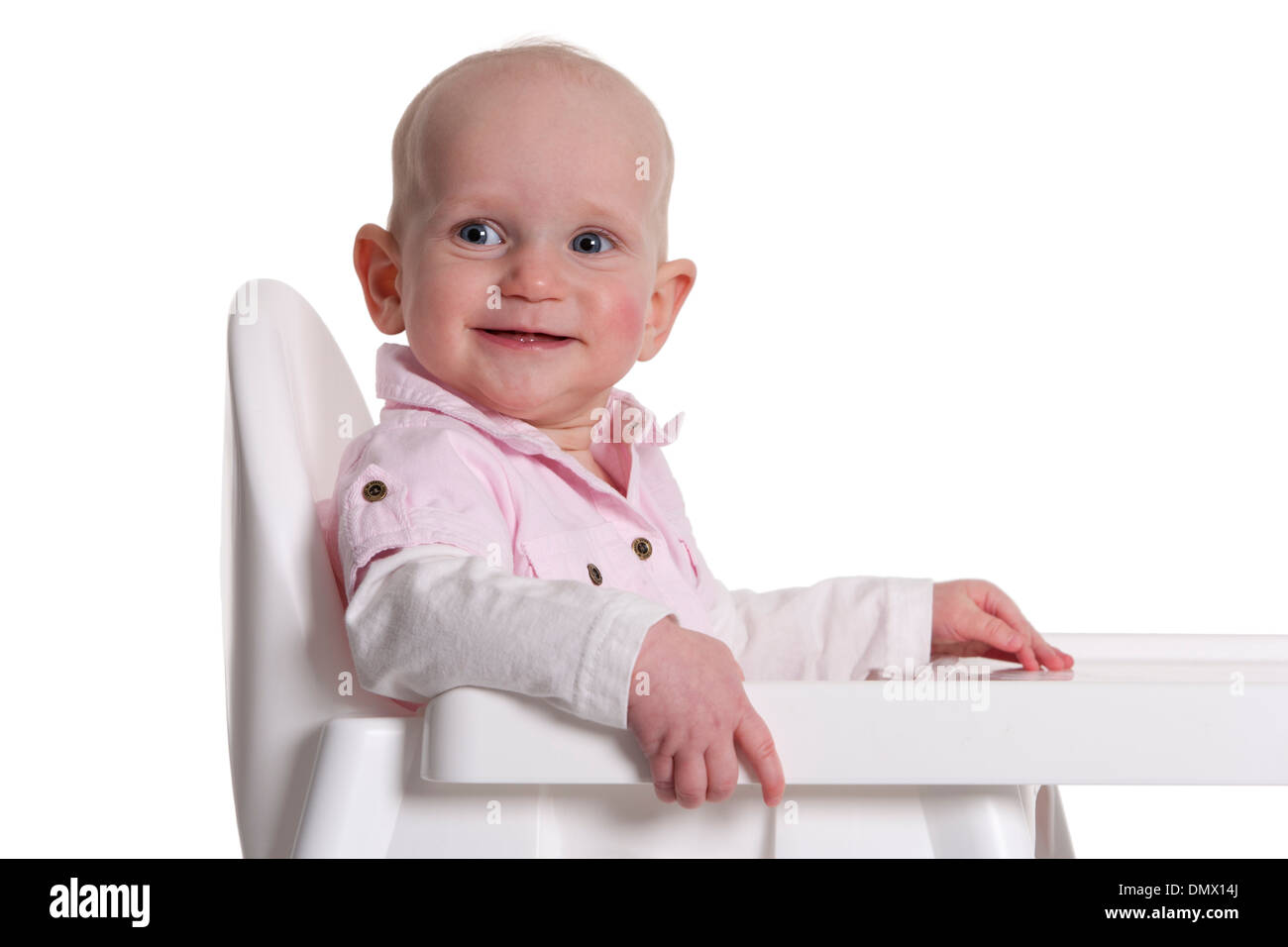 Girl sitting on chair smiling hi-res stock photography and images - Alamy