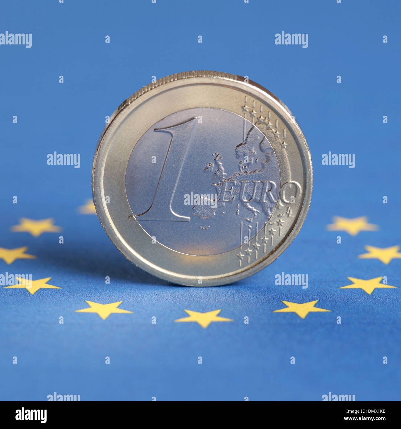 One Euro coin on the EU flag Stock Photo