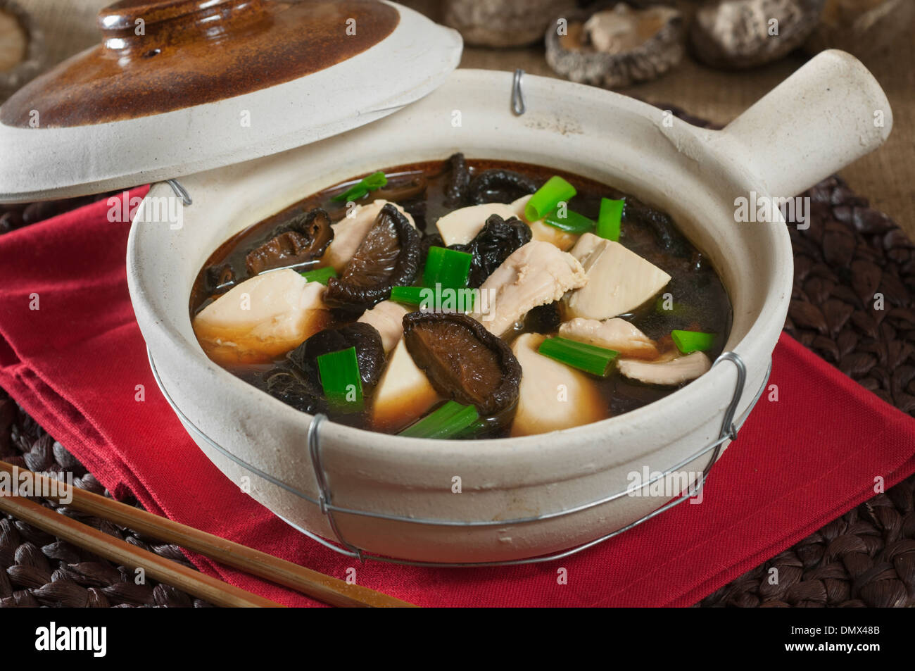 Clay pot chicken with mushrooms. Chinese food Stock Photo