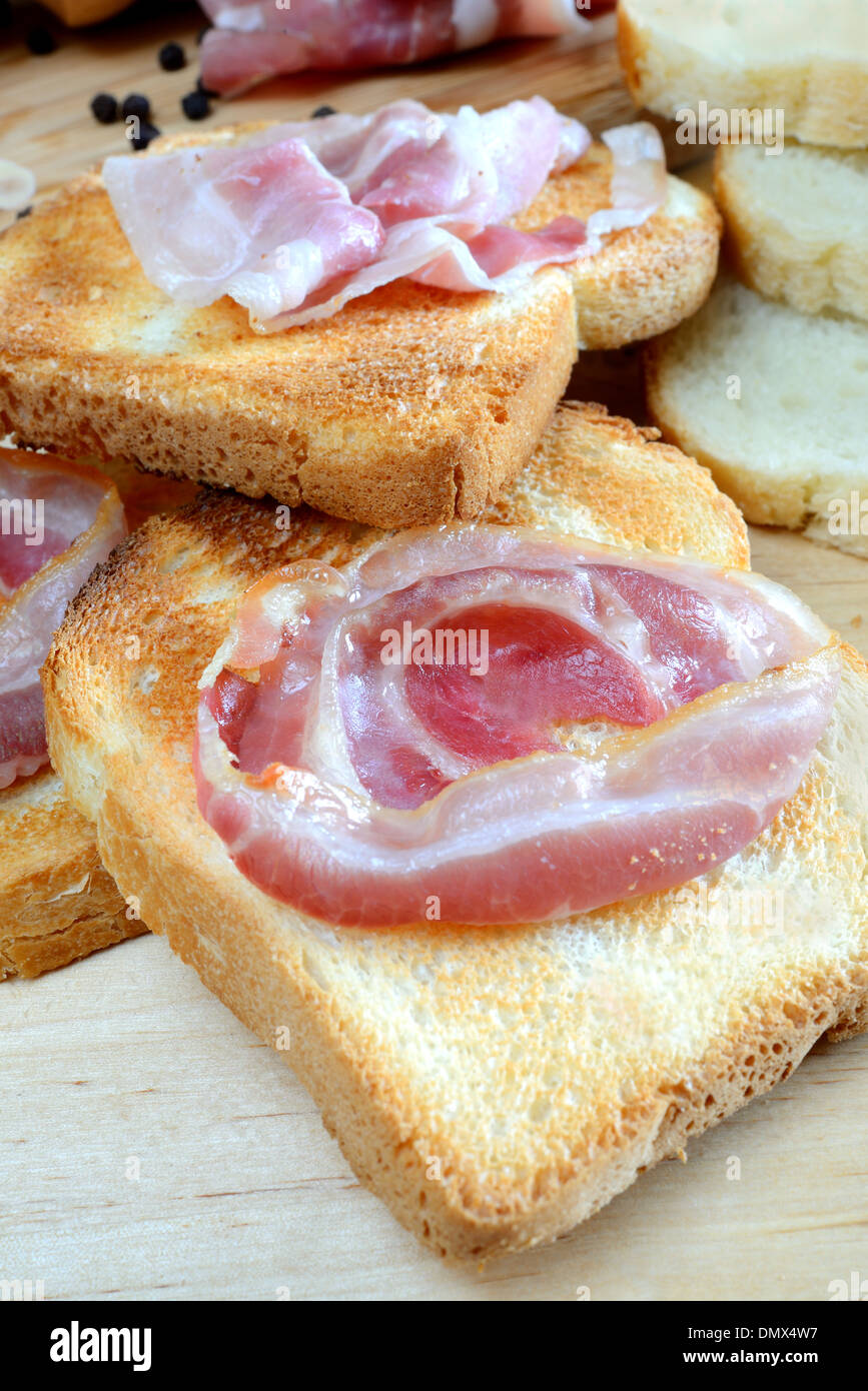 fired egg with bacon and toasted bread Stock Photo