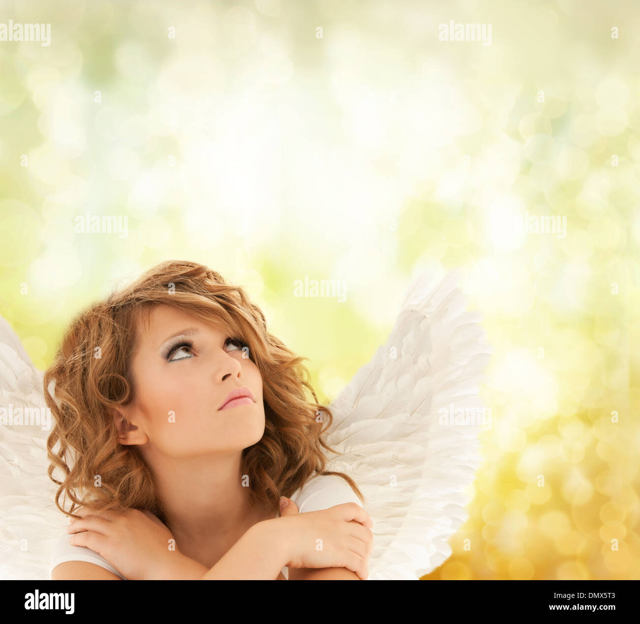 unhappy teenage angel girl Stock Photo
