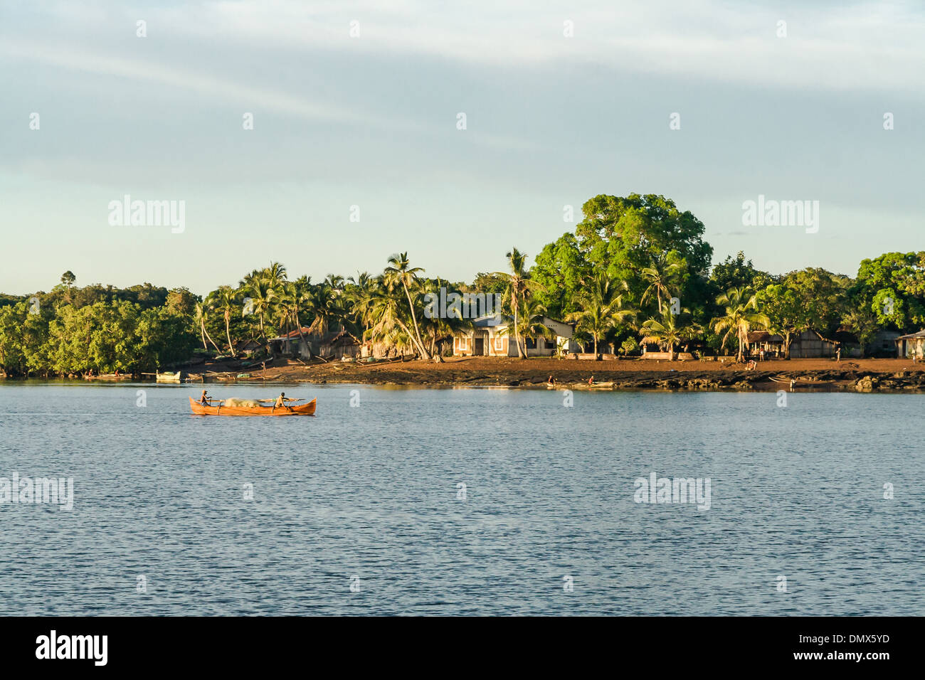 Malagasy people going fishing in an outrigger canoe Stock Photo
