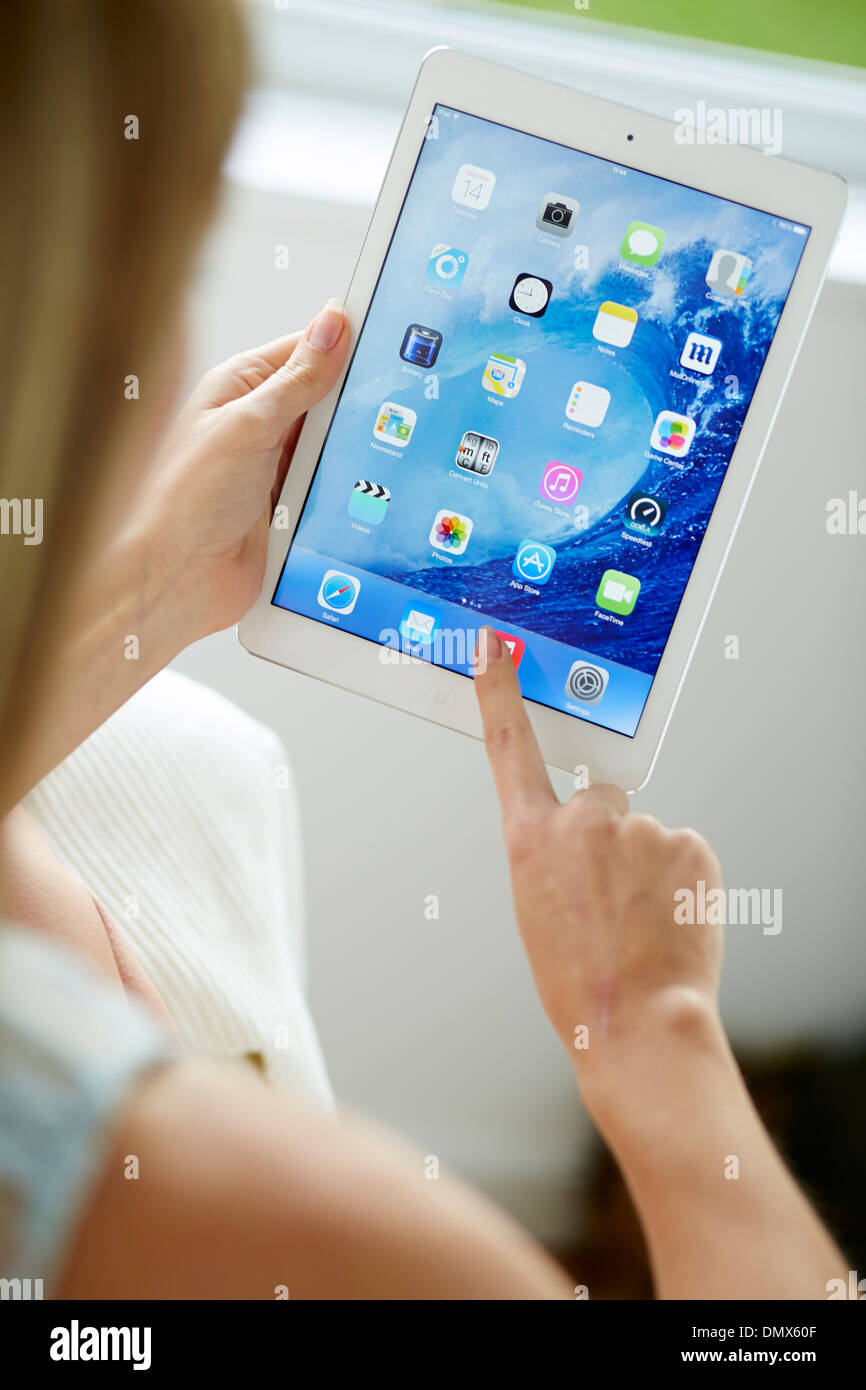 Woman using iPad Stock Photo