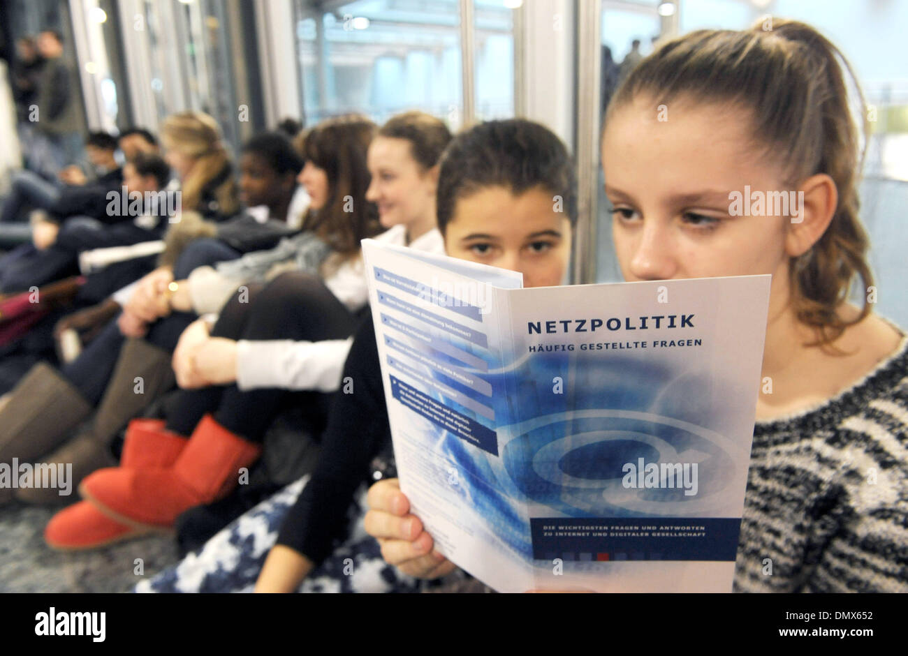 Bremen, Germany. 17th Dec, 2013. Students inform themselves at the fair 'Abgestuerzt? Sicherheit im Netz' (lit: Crashed? Security in the net) about internet security in Bremen, Germany, 17 December 2013. The fair aims to inform school students about the dangers of the internet. Photo: Ingo Wagner/dpa/Alamy Live News Stock Photo