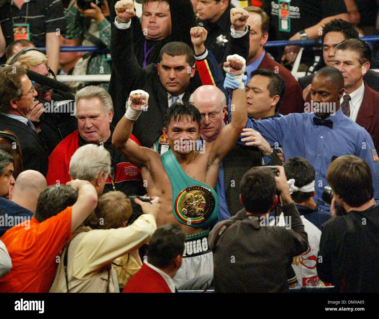 Jan 21, 2006; Las Vegas, NV, USA; MANNY PACQUIAO of the Philippines, celebrates after stopping Erik Morales in the 10th round to win the super featherweight boxing match Saturday night. Mandatory Credit: Photo by J.P. Yim/ZUMA Press. (©) Copyright 2006 by J. P. Yim Stock Photo