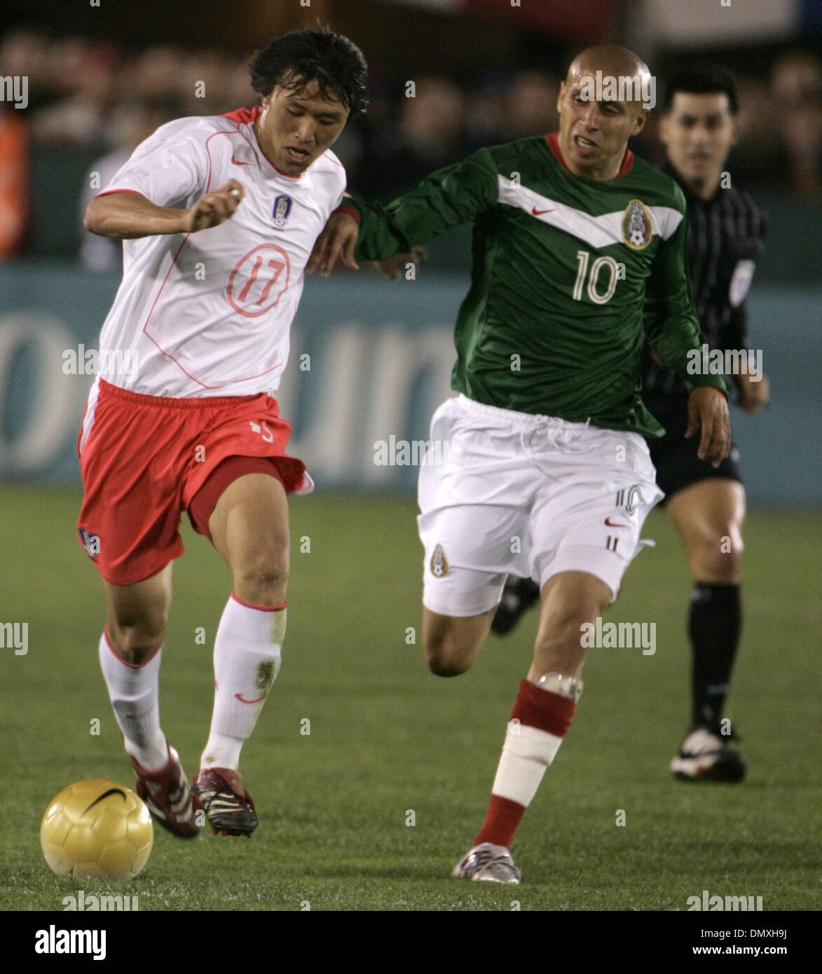Feb 15, 2006; Los Angeles, CA, USA; SOCCER: (10) Adolfo Bautista from the National Team of Mexico  fights for the ball against (17) Ho Lee from the national team of Korea Republic during their tune up match prior to the world cup at the Los Angeles Memorial Coliseum Wednesday 15 February 2006. Korea won the game 1-0. Mandatory Credit: Photo by Armando Arorizo/ZUMA Press. (©) Copyri Stock Photo