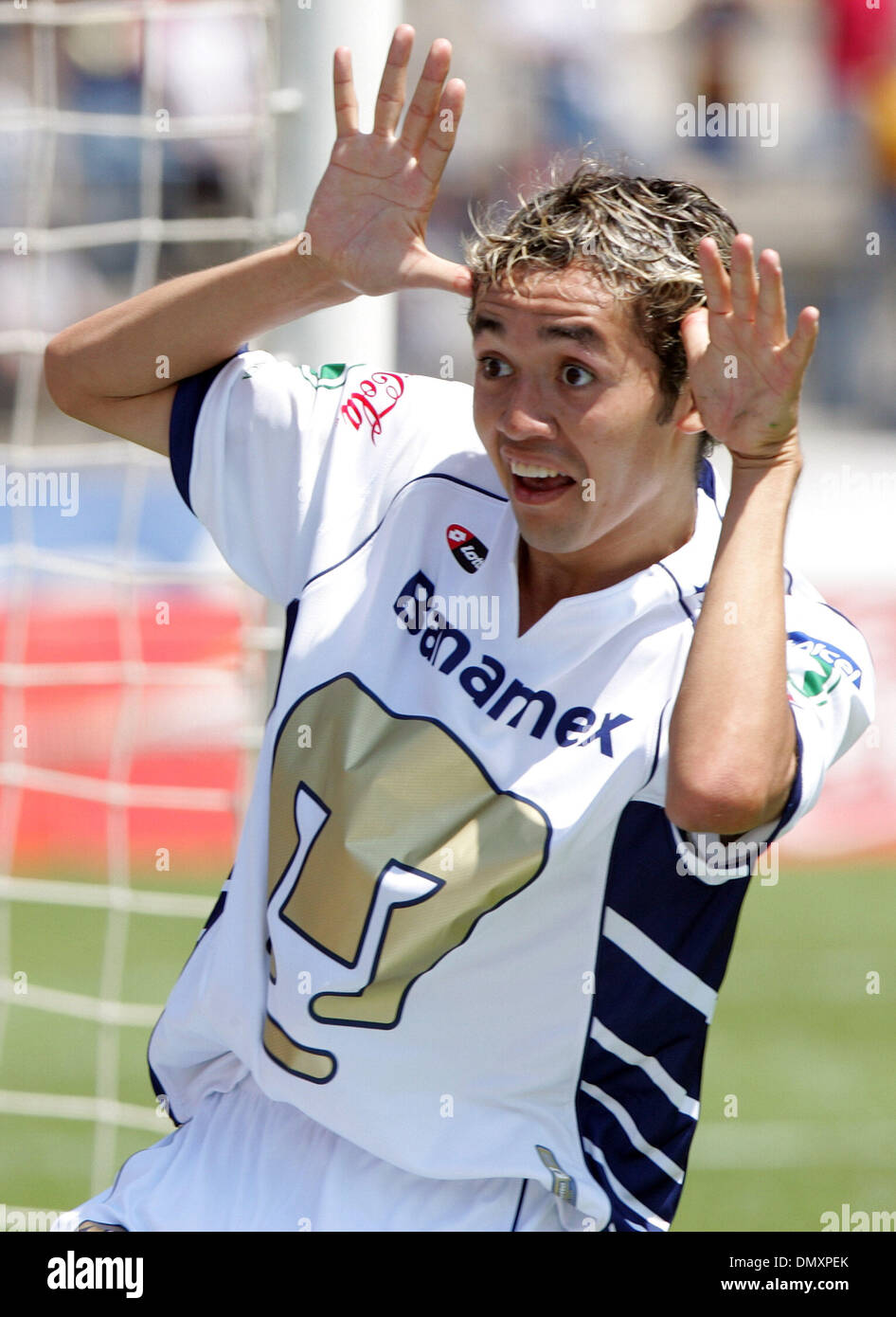 Mar 12, 2006; Mexico City, DF, MEXICO; SOCCER: UNAM Pumas' midfielder Marco  Antonio Palacios (R) heads the ball on top of Morelia Monarcas' Cristian  Nasuti ( Bottom L) and Gustavo Trujillo as