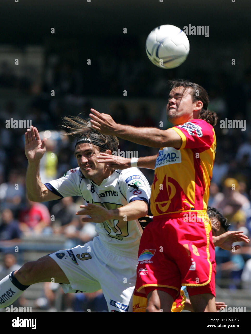 Mar 19, 2006; Mexico City, Mexico; UNAM Pumas BRUNO MARIONI fights for the ball with UAG Tecos defender Miguel Hernandez during their soccer match at the University Stadium in Mexico City. UAG Tecos won 1-0 against the UNAM Pumas. Mandatory Credit: Photo by Javier Rodriguez/ZUMA Press. (©) Copyright 2006 by Javier Rodriguez Stock Photo