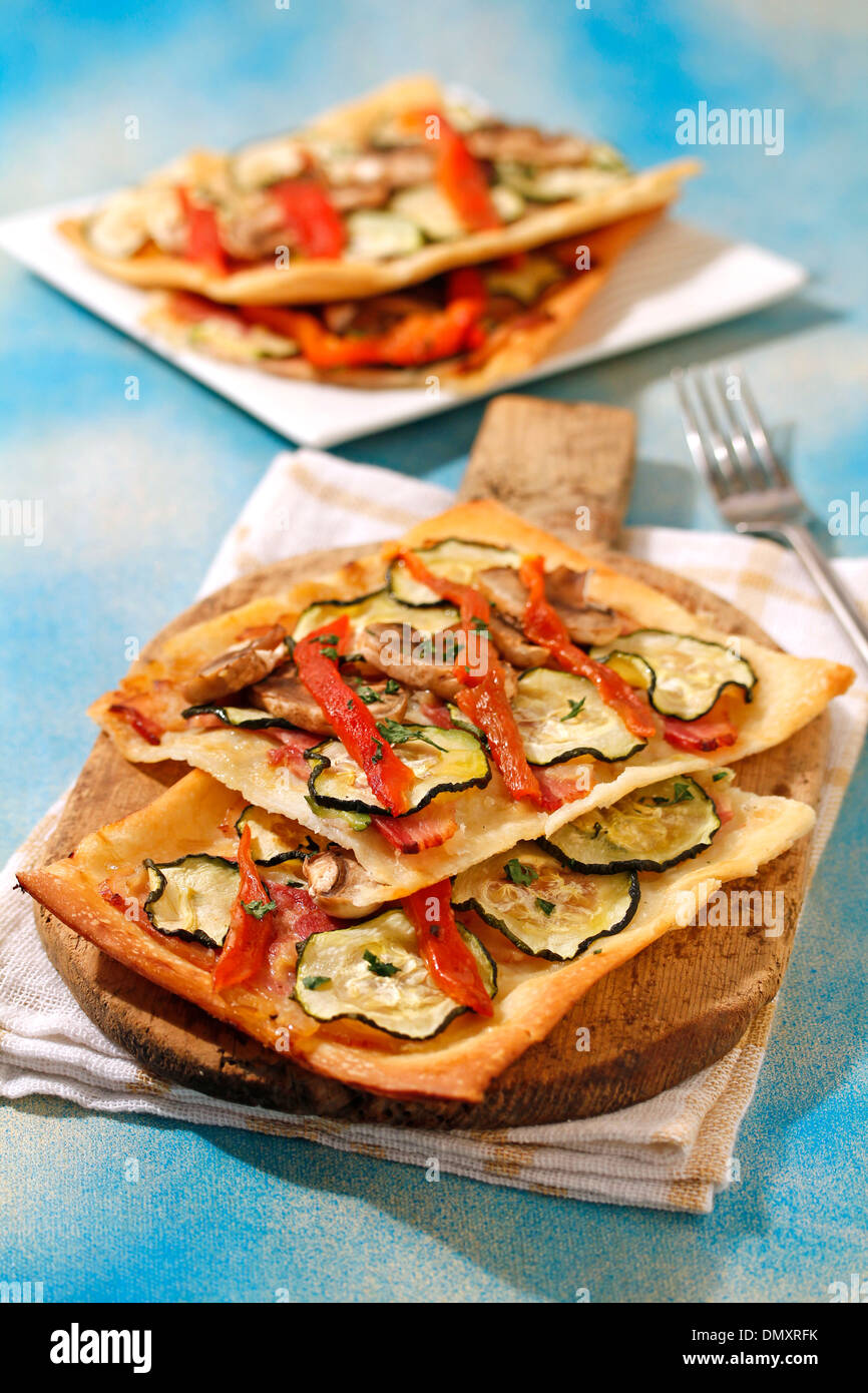 Savory pastry with bacon and vegetables. Recipe available Stock Photo